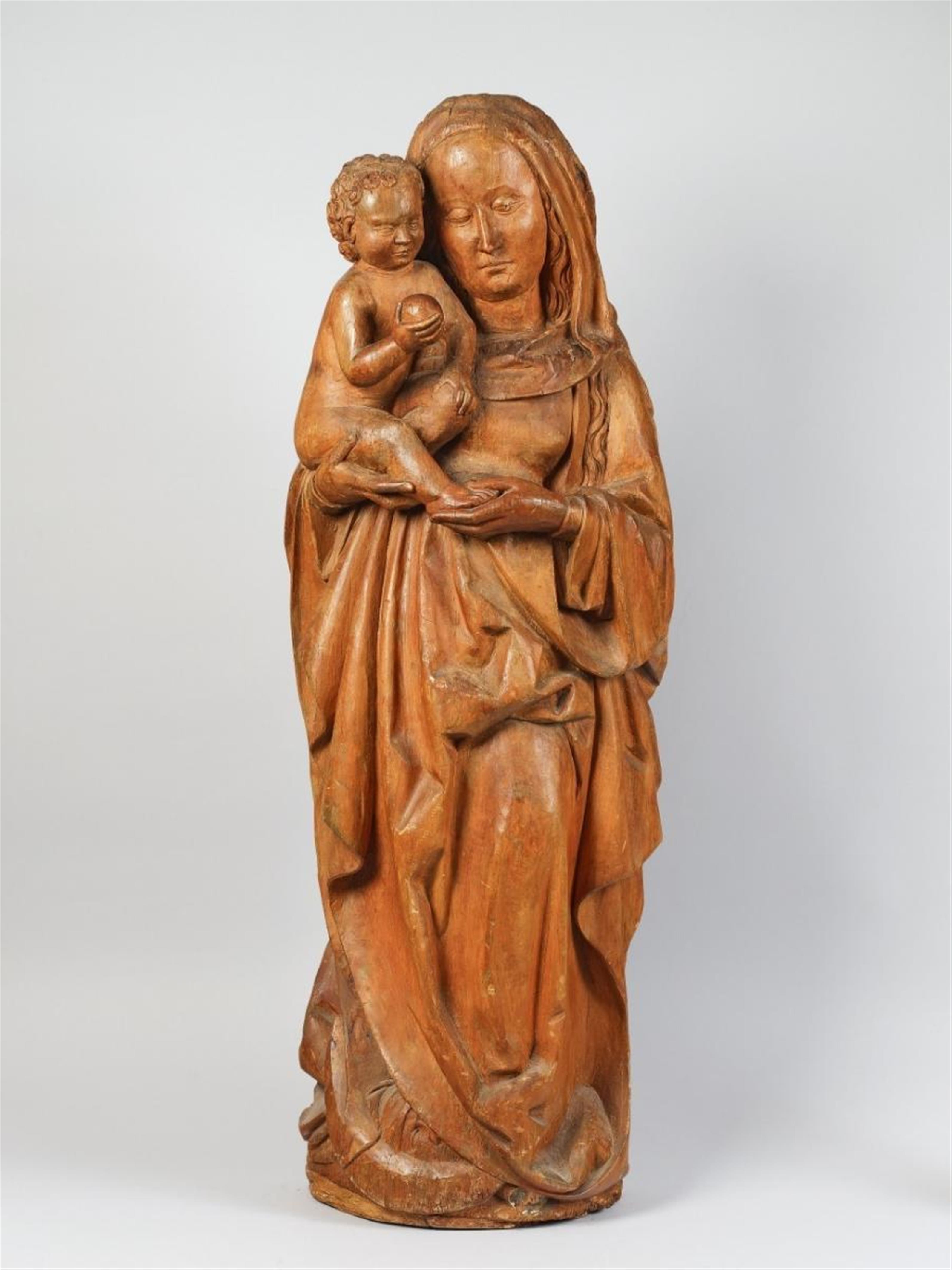 A 15TH CENTURY HIGH-RELIEF WOOD FIGURE OF THE VIRGIN WITH CHILD, PRESUMABLY CENTRAL RHENISH - image-1
