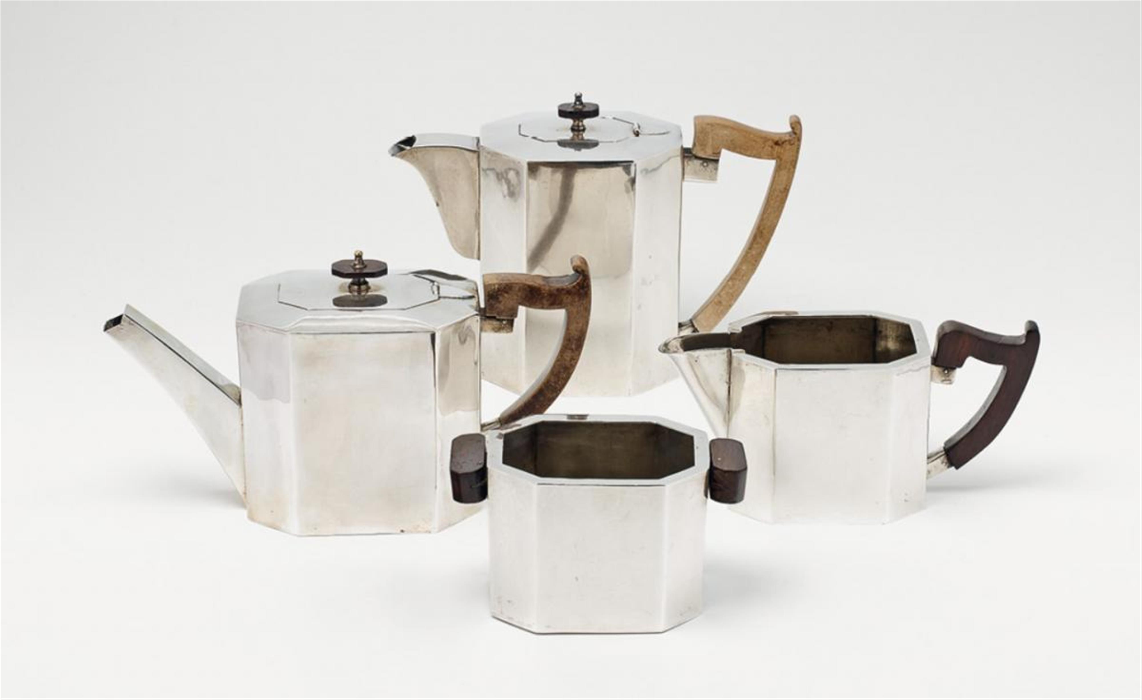An art déco silver service. Comprising tea and coffeepot, sugar box and milk jug. Fineness 800, no maker's mark. Probably Belgian, ca. 1920. - image-1