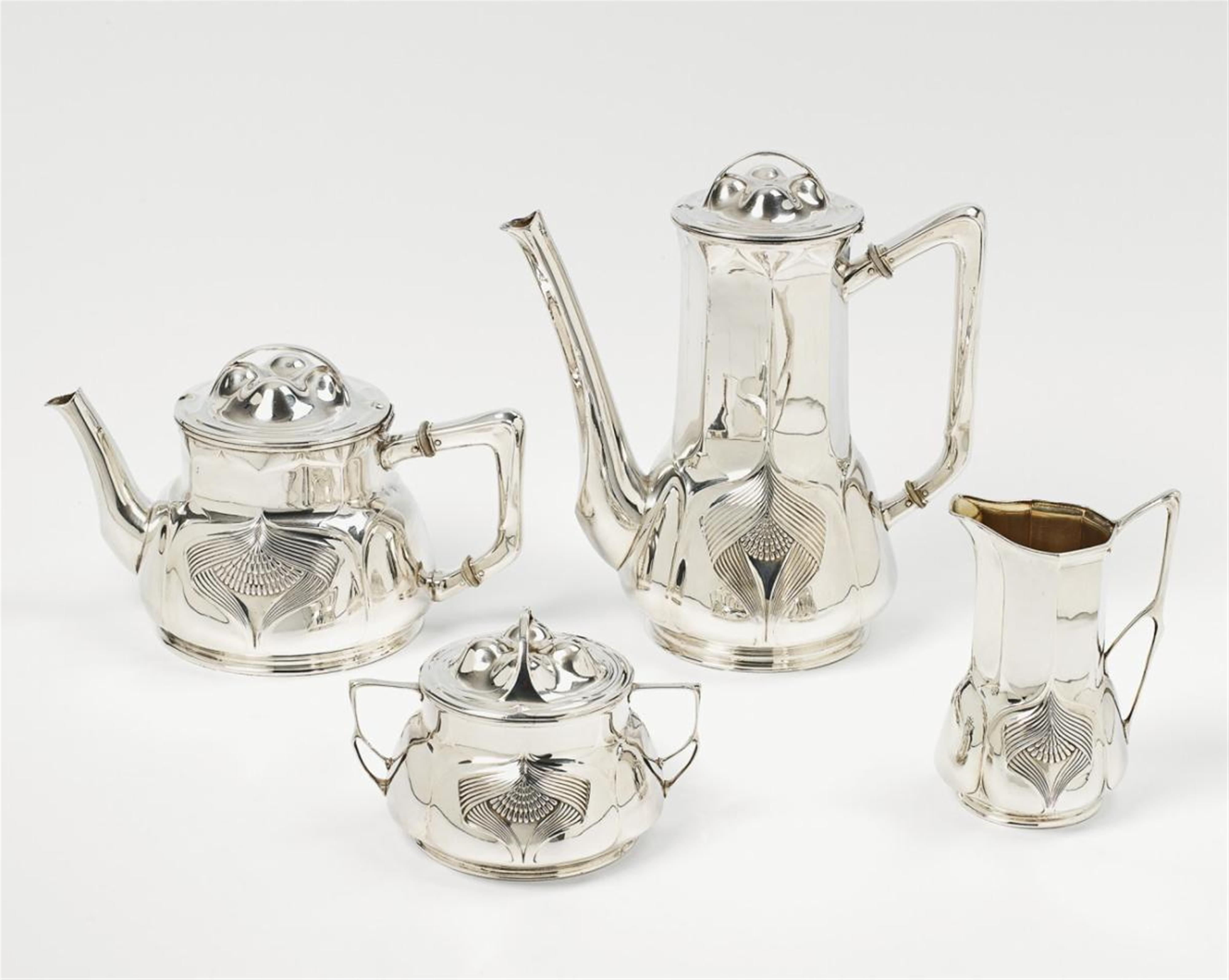 A Cologne silver partially gilt service. Comprising coffee and teapots, milk jug and sugar box. Marks of Orivit, 1903/04. - image-1