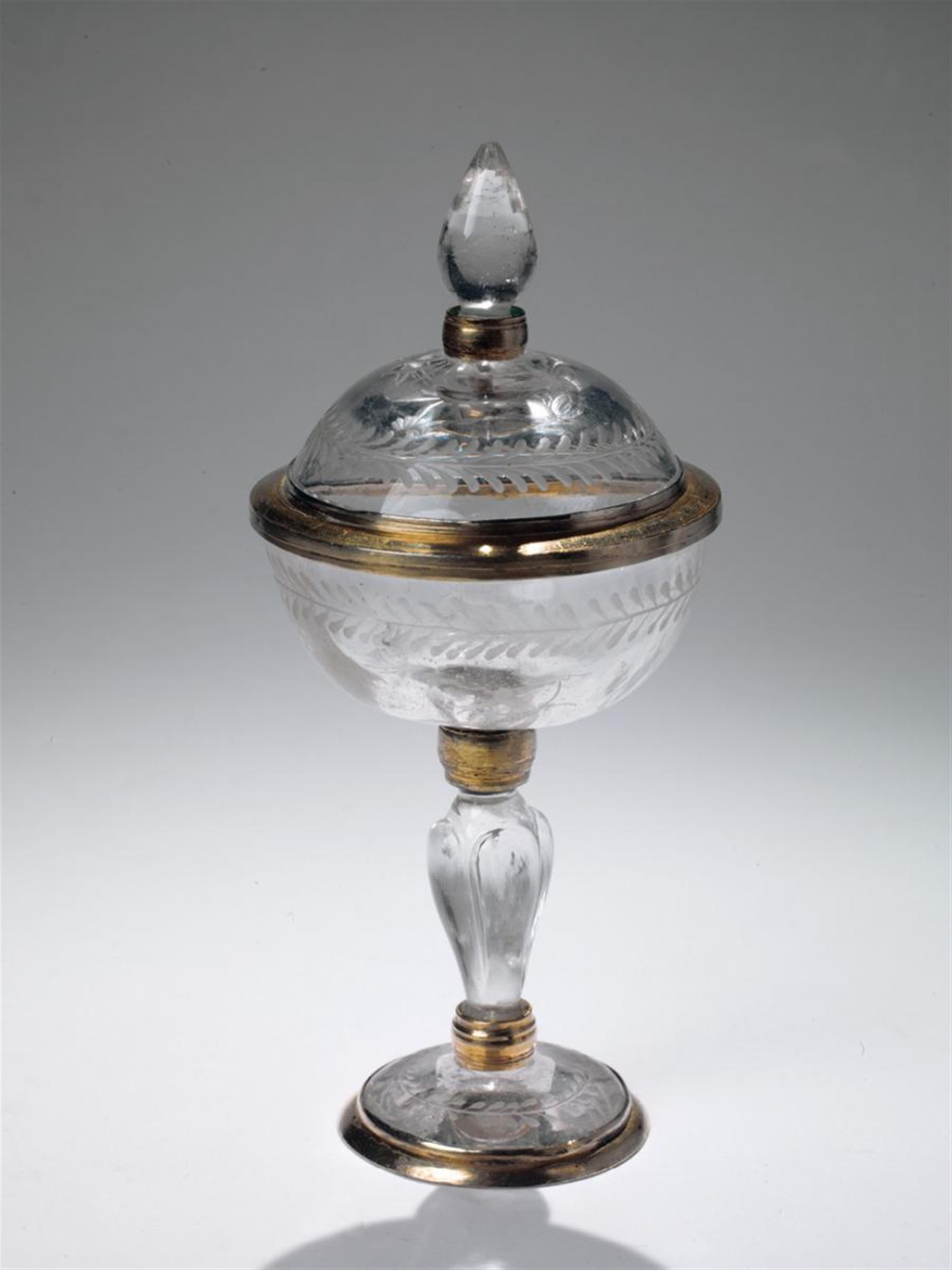 A German vermeil-mounted engraved rock crystal cup and cover. - image-1
