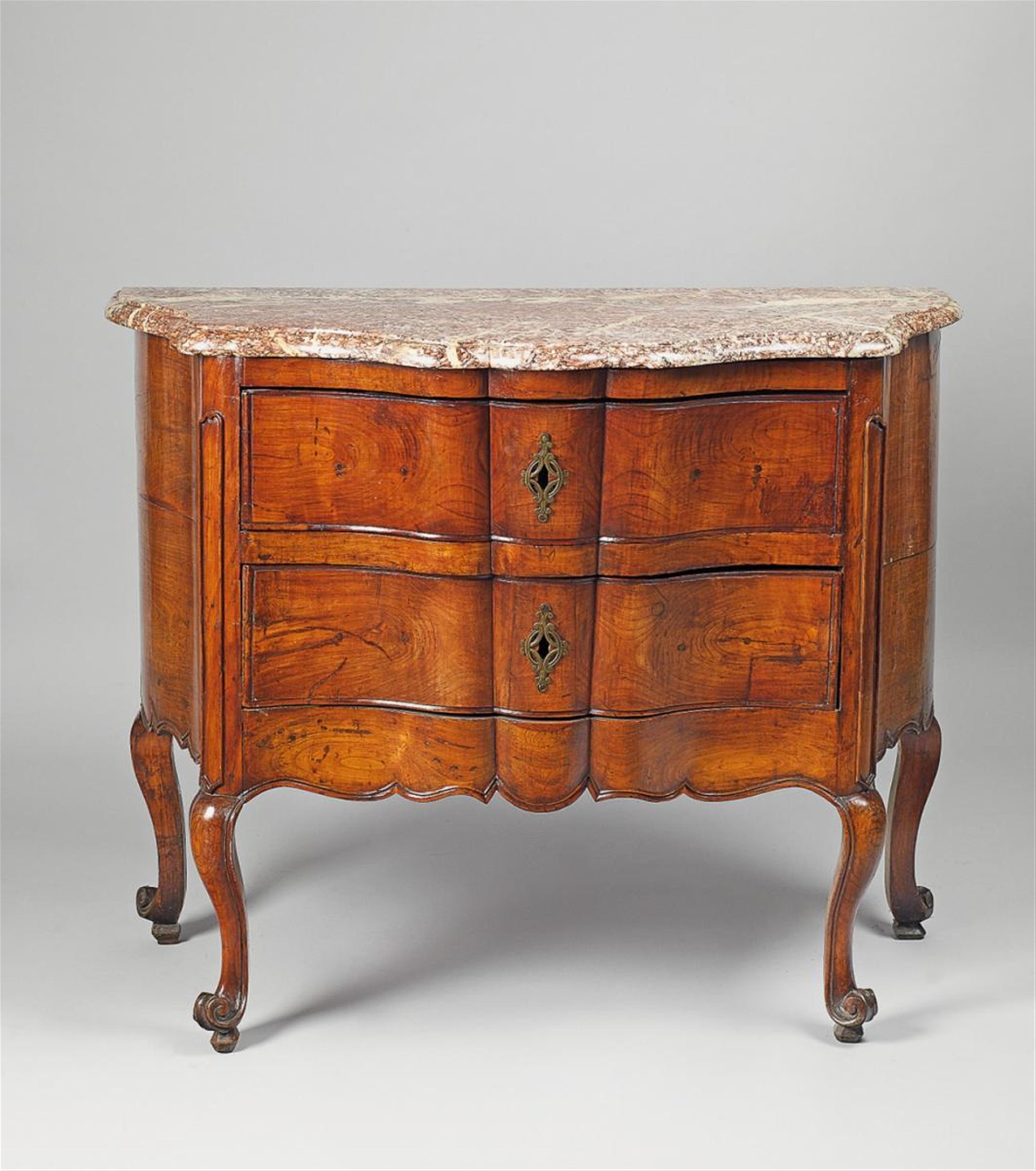 A Southern European Baroque breakfront chest of drawers - image-1