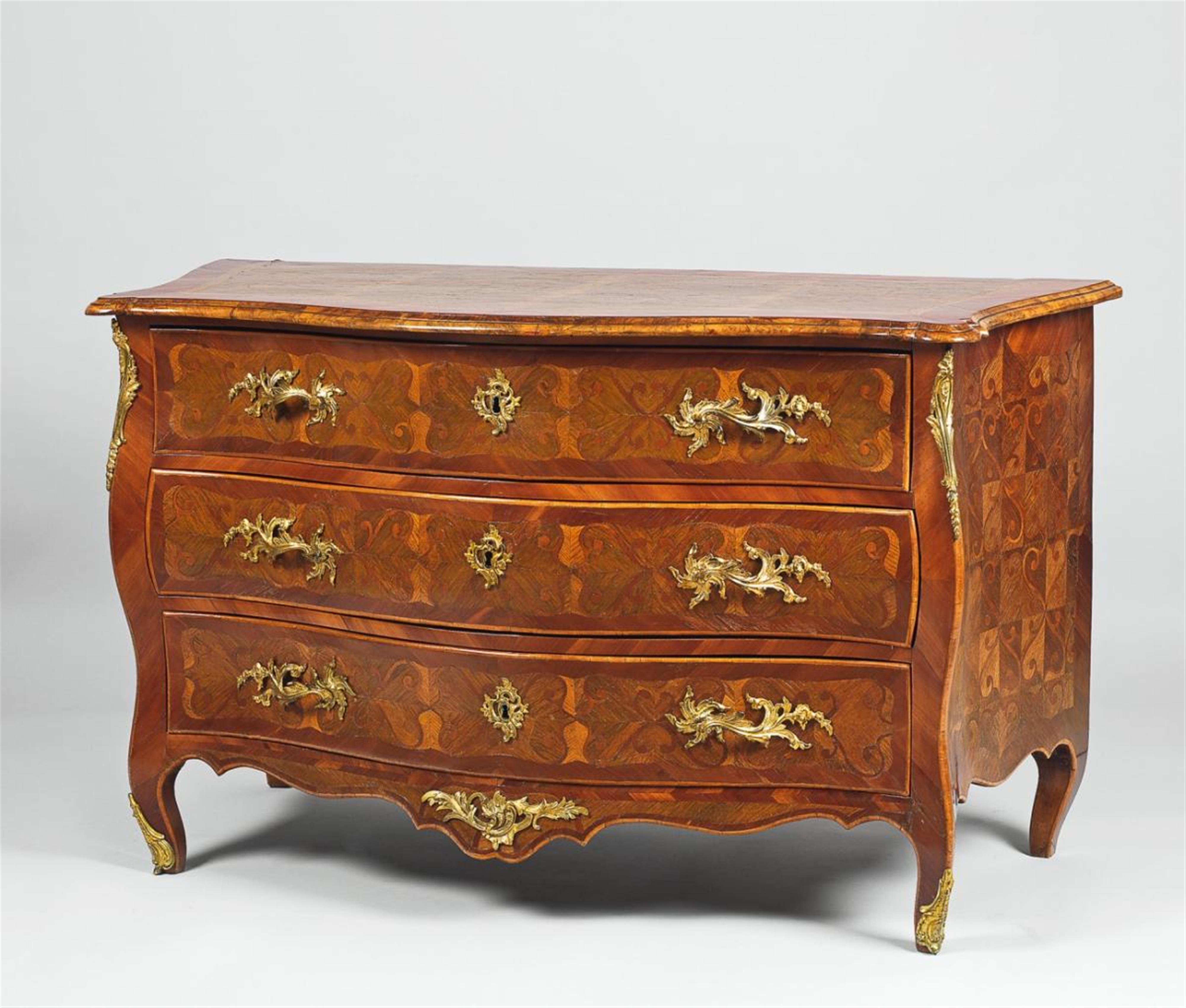 A late Baroque German bombe-form chest of drawers - image-1