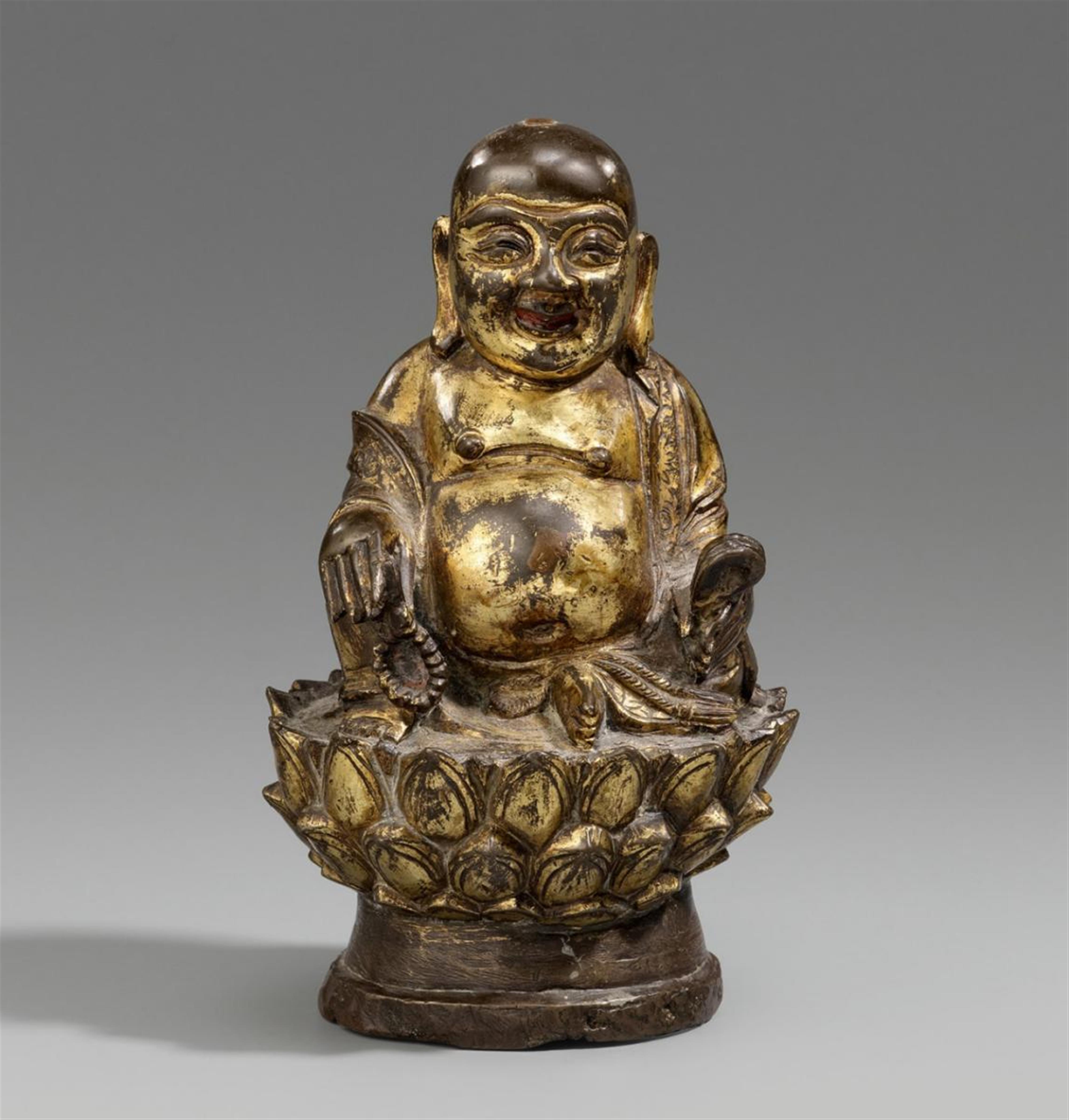 A fire-gilt bronze figure of Budai, also called Milefo. 17th/18th century - image-1