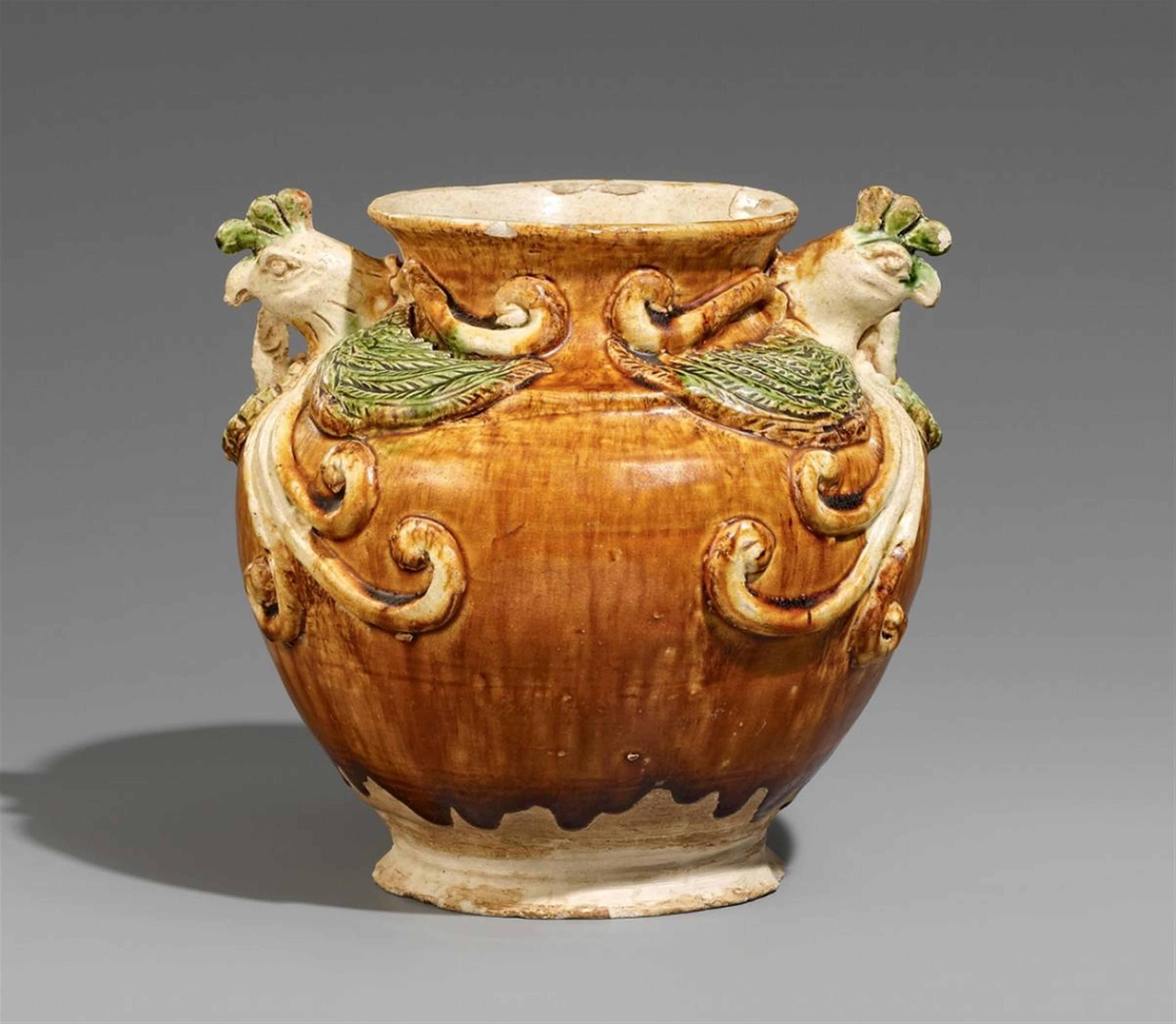 A pottery jar with phoenix handles. Tang dynasty (618-907) or later - image-1