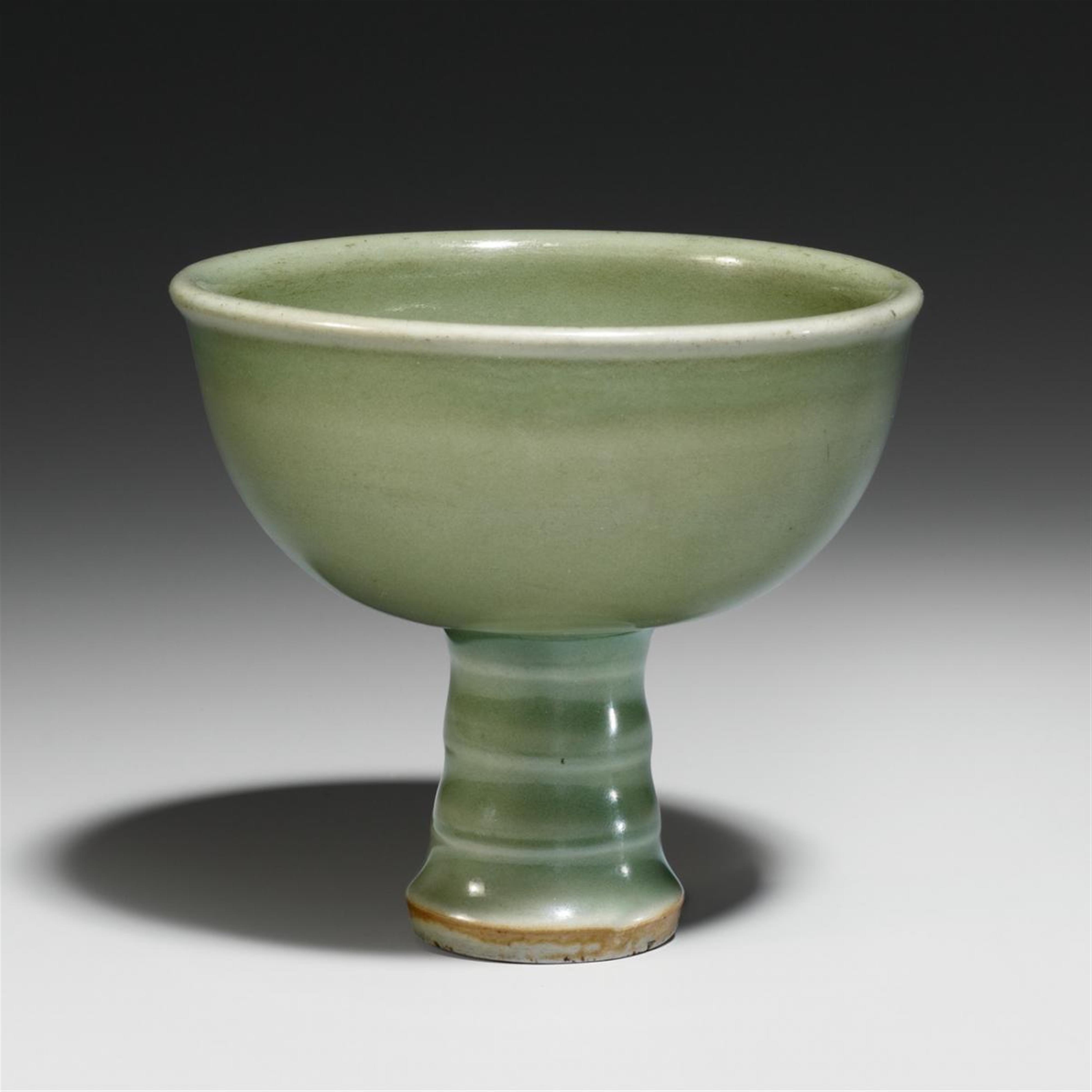 A Longquan celadon-glazed stemcup. 14th/15th century - image-1