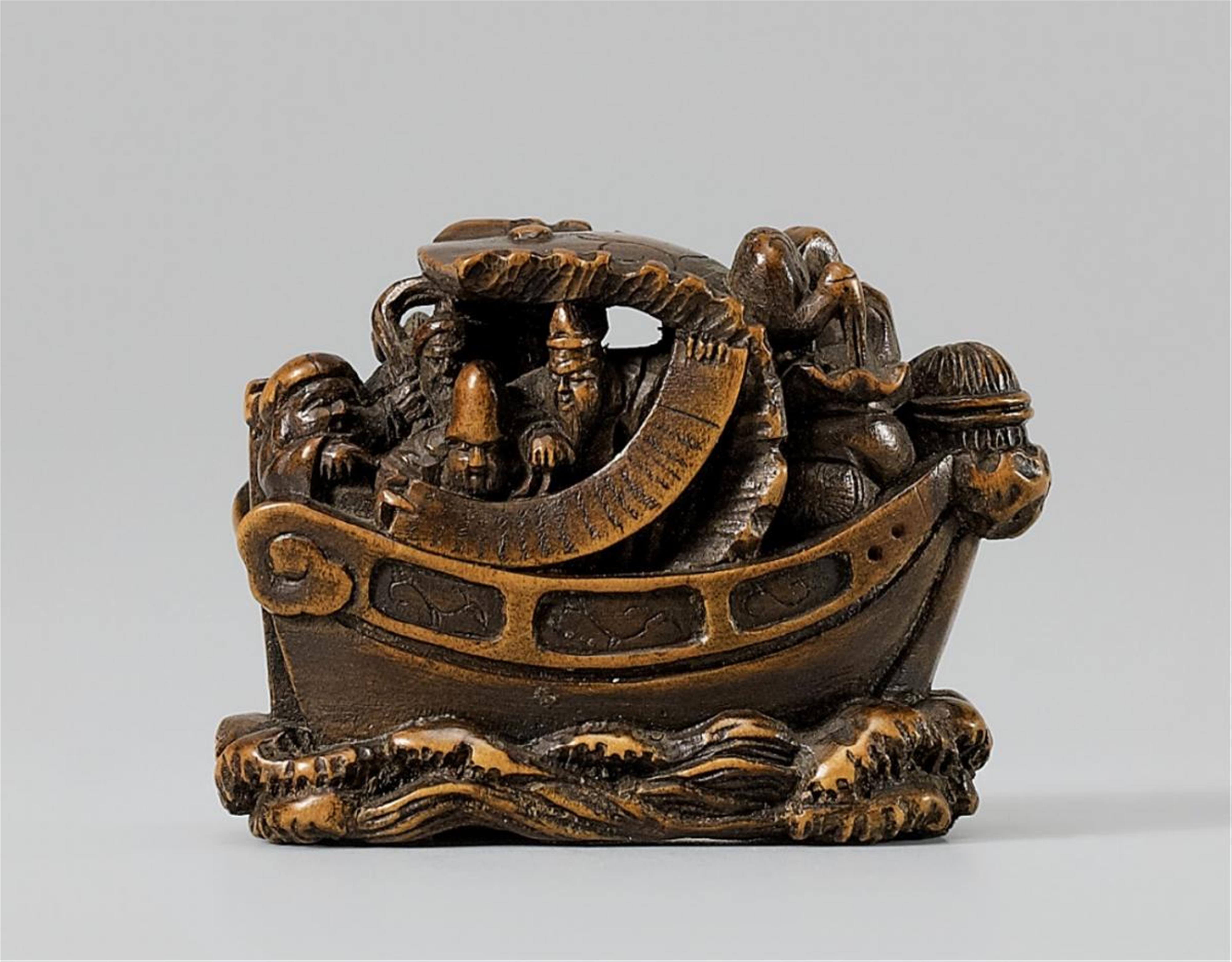A wood netsuke of the Seven Gods of Good Luck in a boat. Late 19th century - image-1