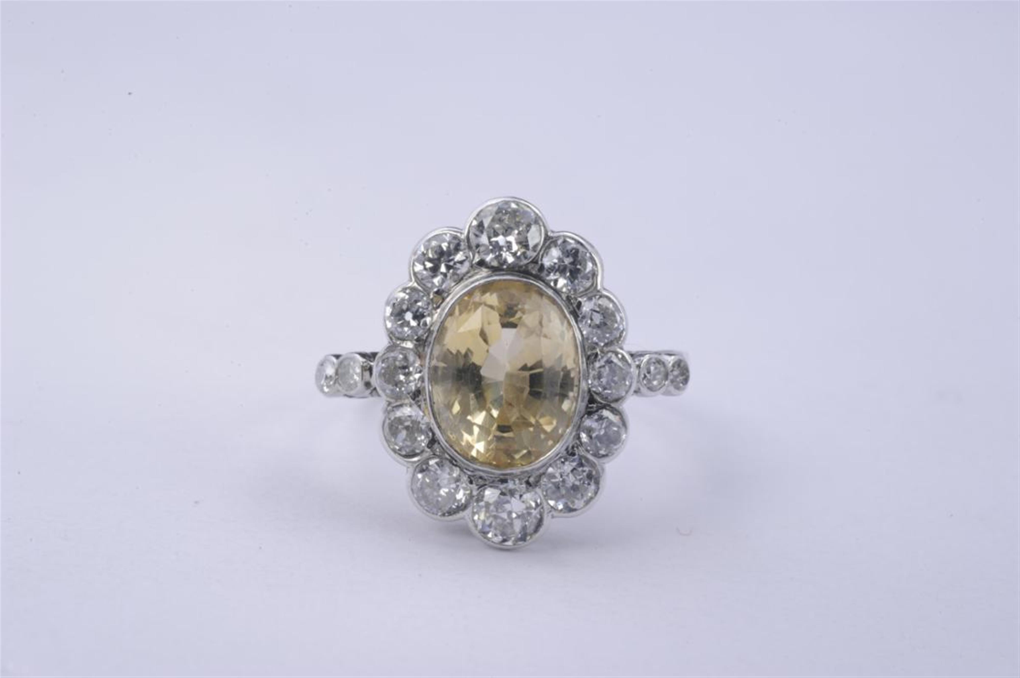 A platinum, diamond and natural yellow sapphire Art Déco ring. - image-1