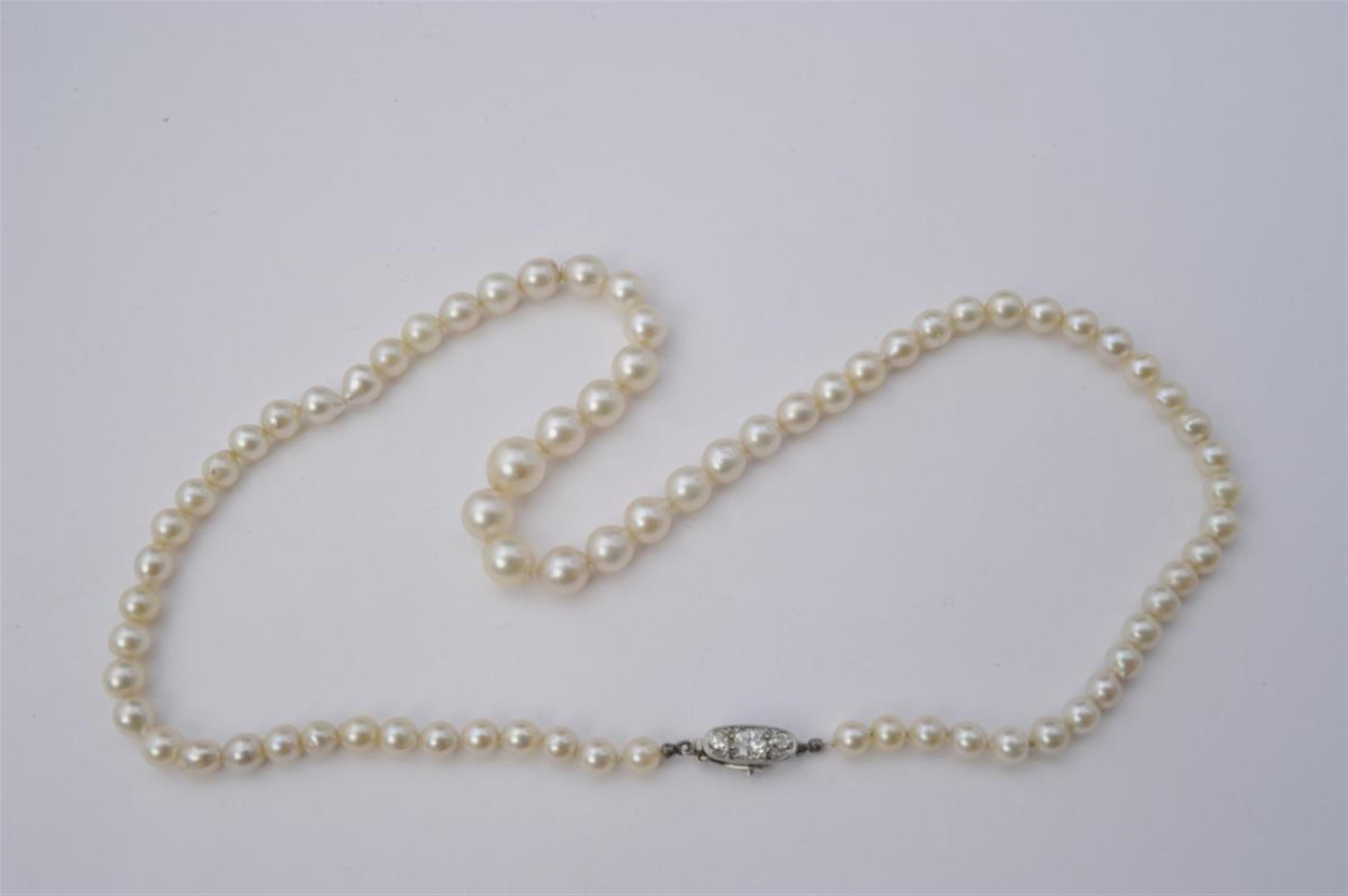 An Art Déco platinum, yellow gold and pearl necklace. - image-2