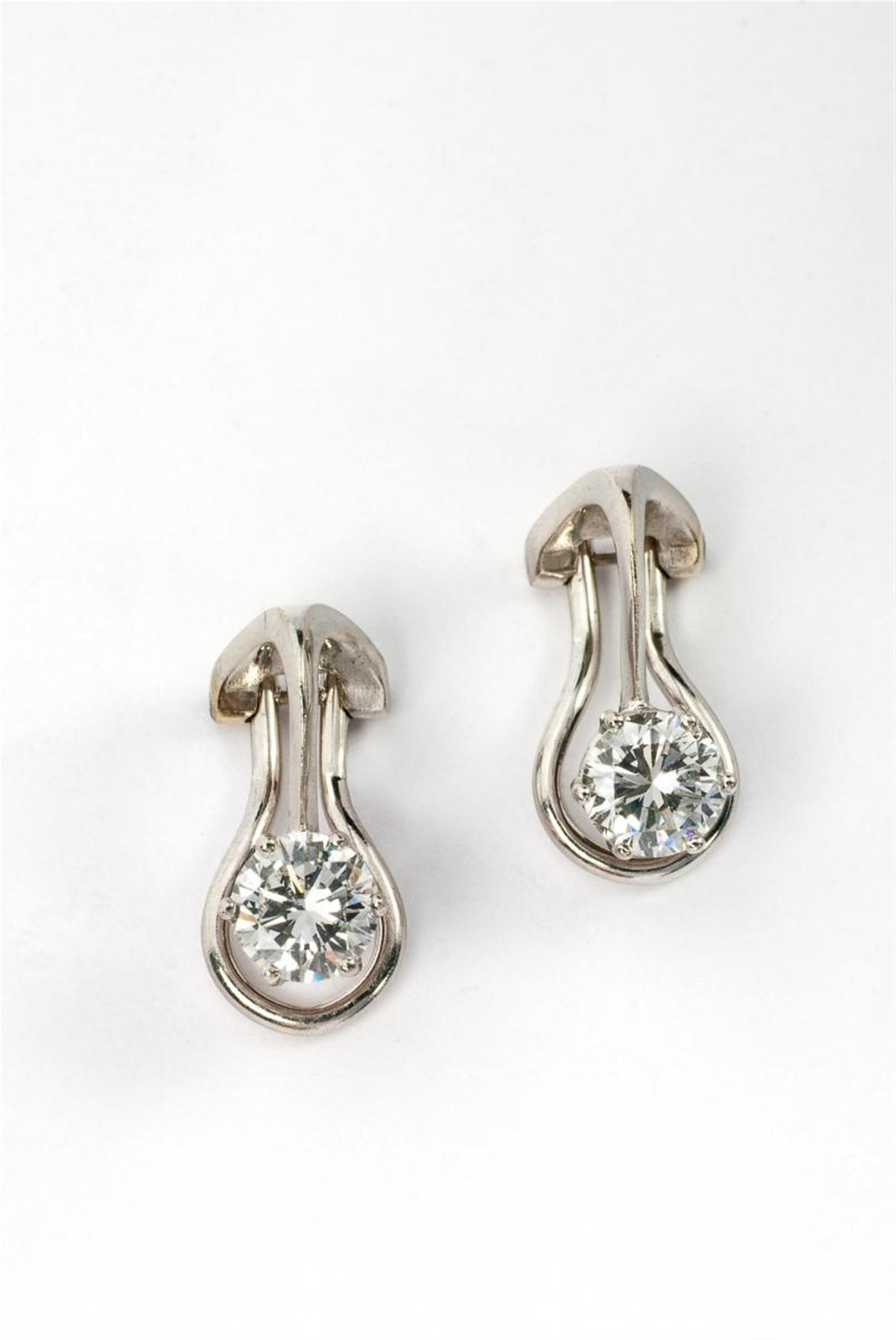 A pair of 18k gold and diamond clip earrings. - image-3