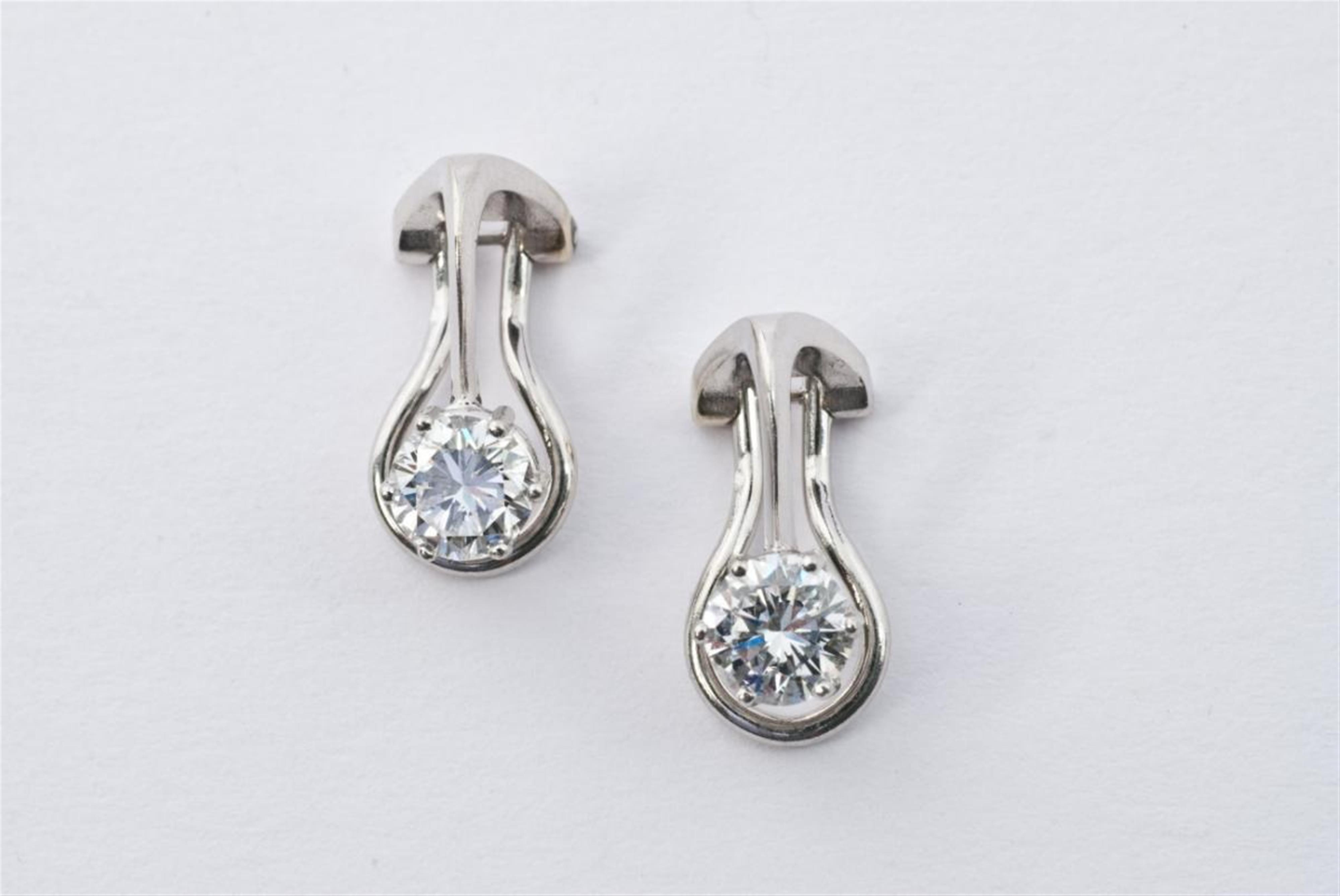 A pair of 18k gold and diamond clip earrings. - image-1