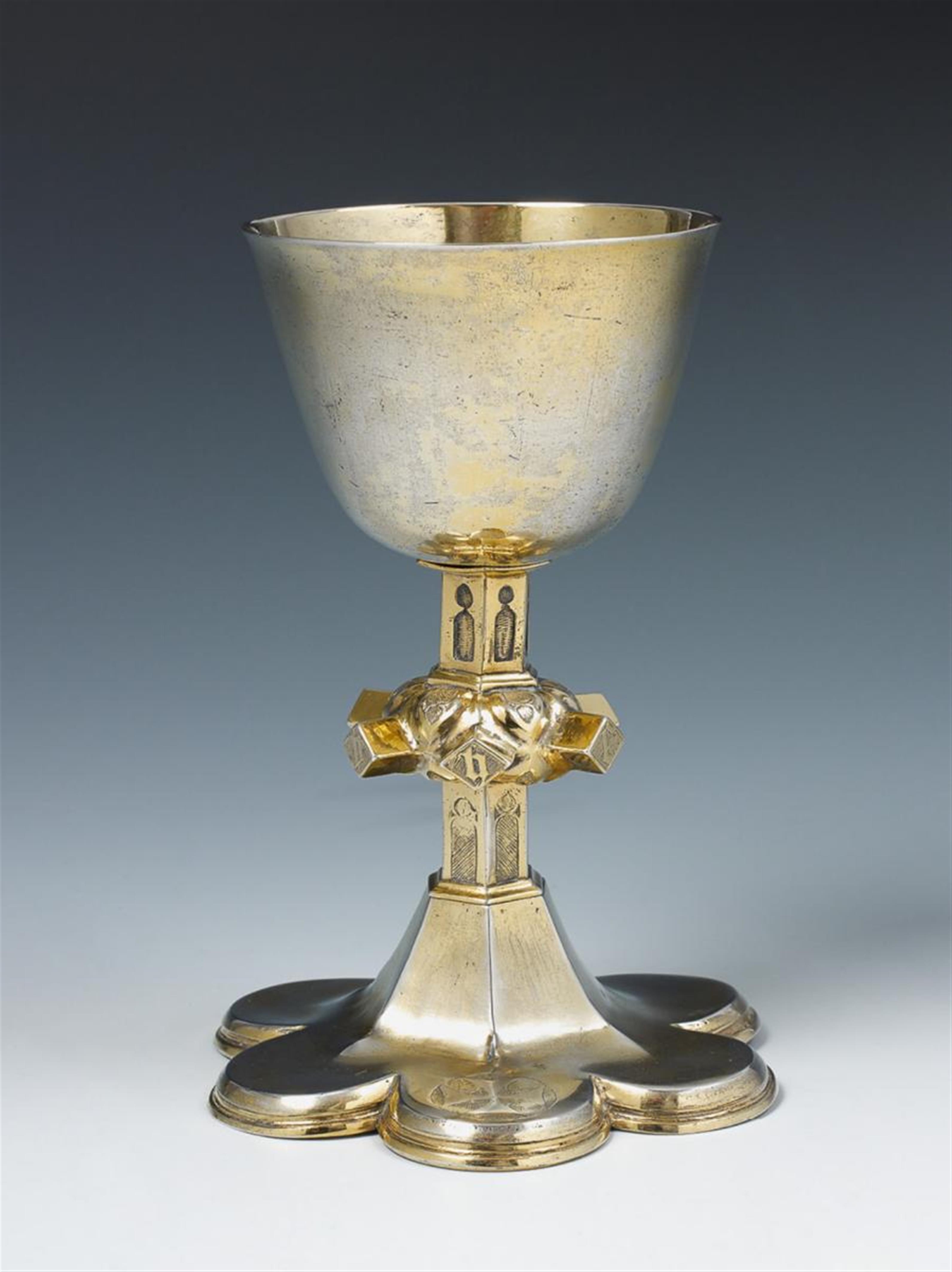 A late Gothic silver gilt communion chalice. The node dented, various soldered repairs and old restorations. Unmarked, probably German, second half 15th C. - image-1