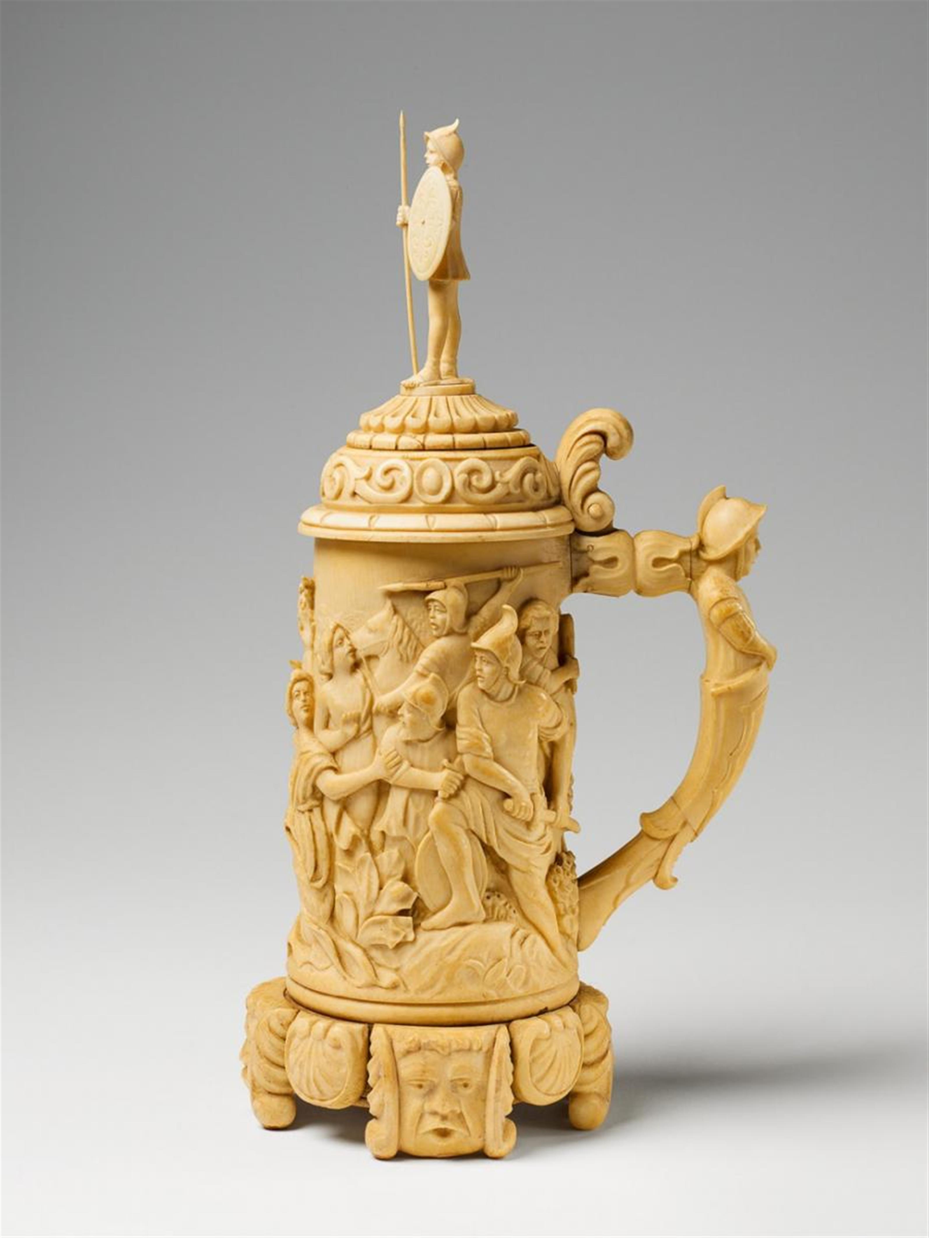A German ivory historicist tankard carved with a classical battle scene. - image-1