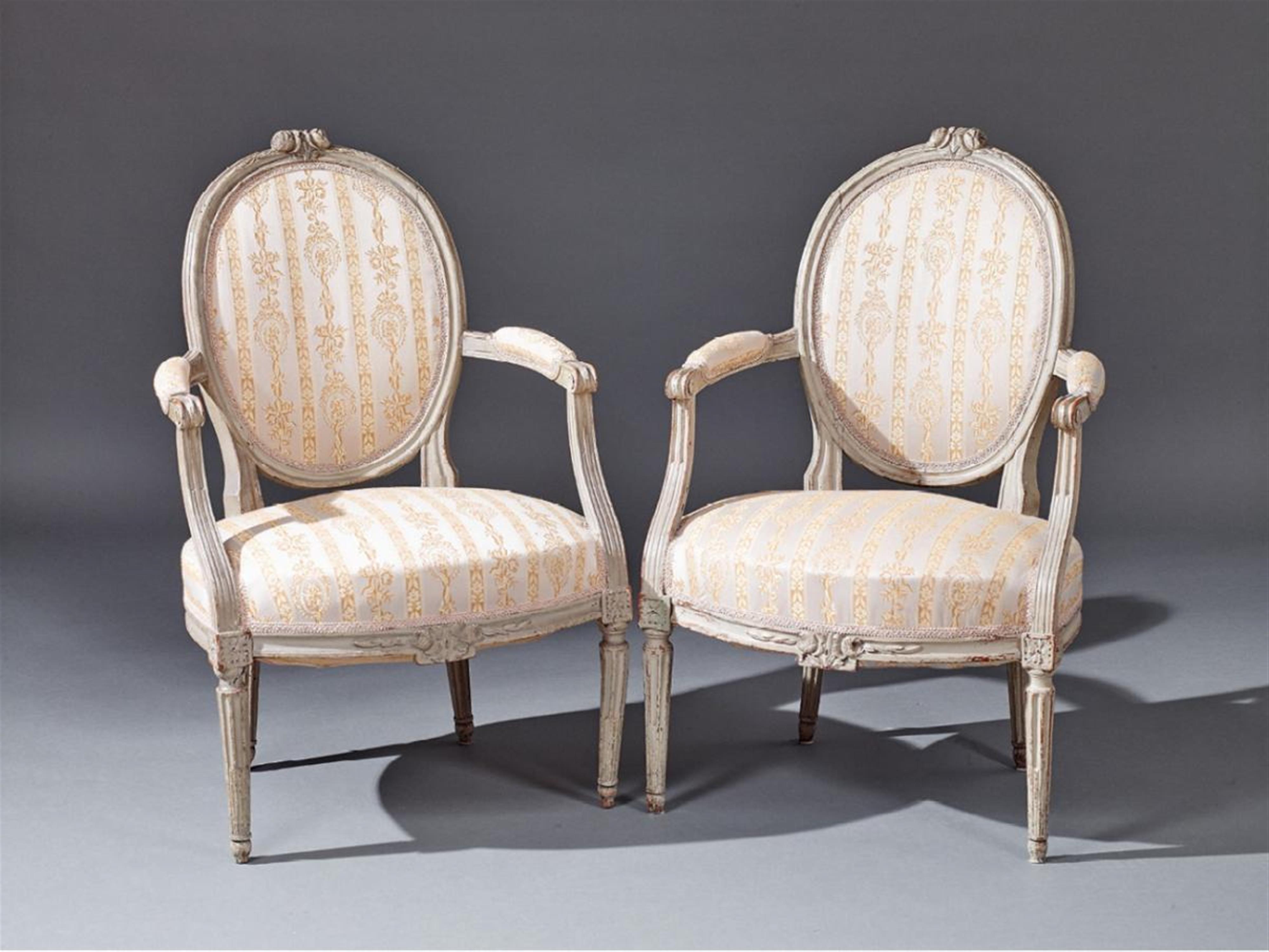 A pair of époque Louis XVI painted beechwood upholstered fauteils. - image-1