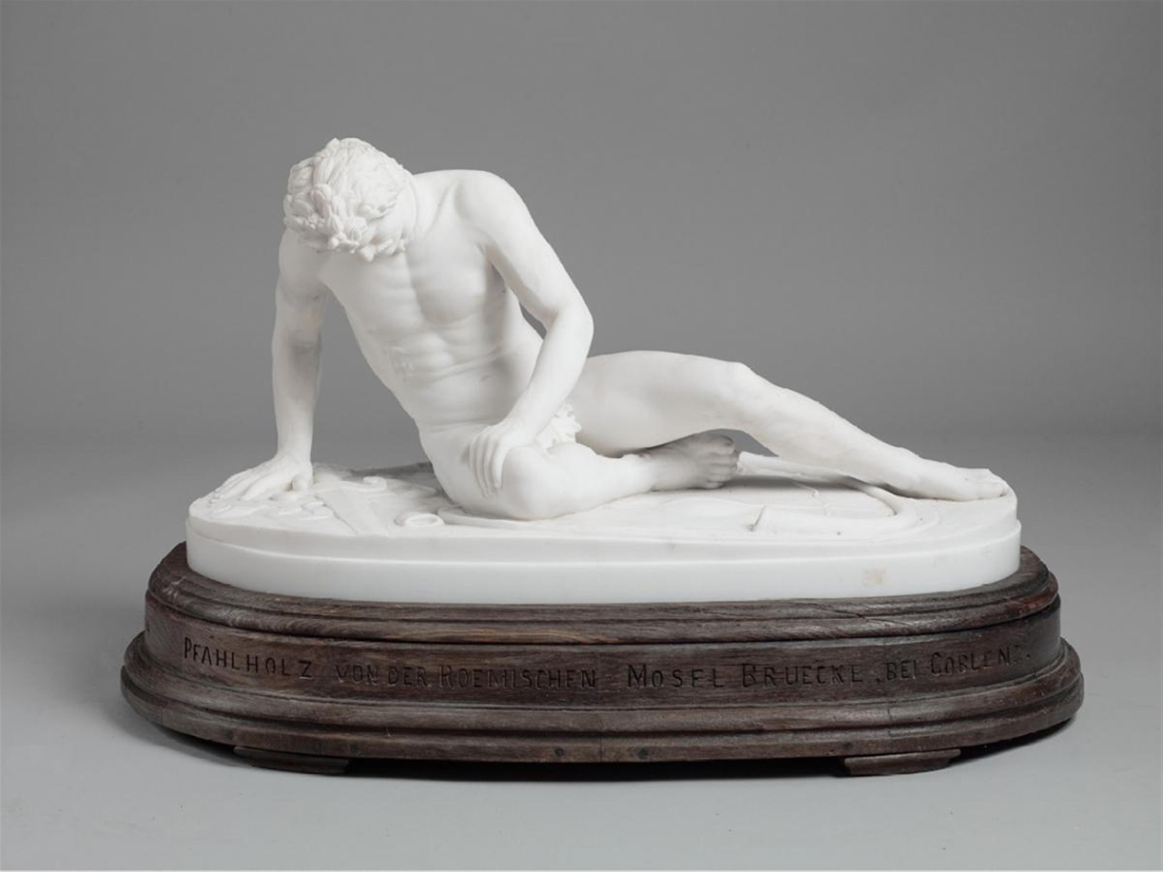 A Roman white marble and oak figure of a dying Gaul. - image-3