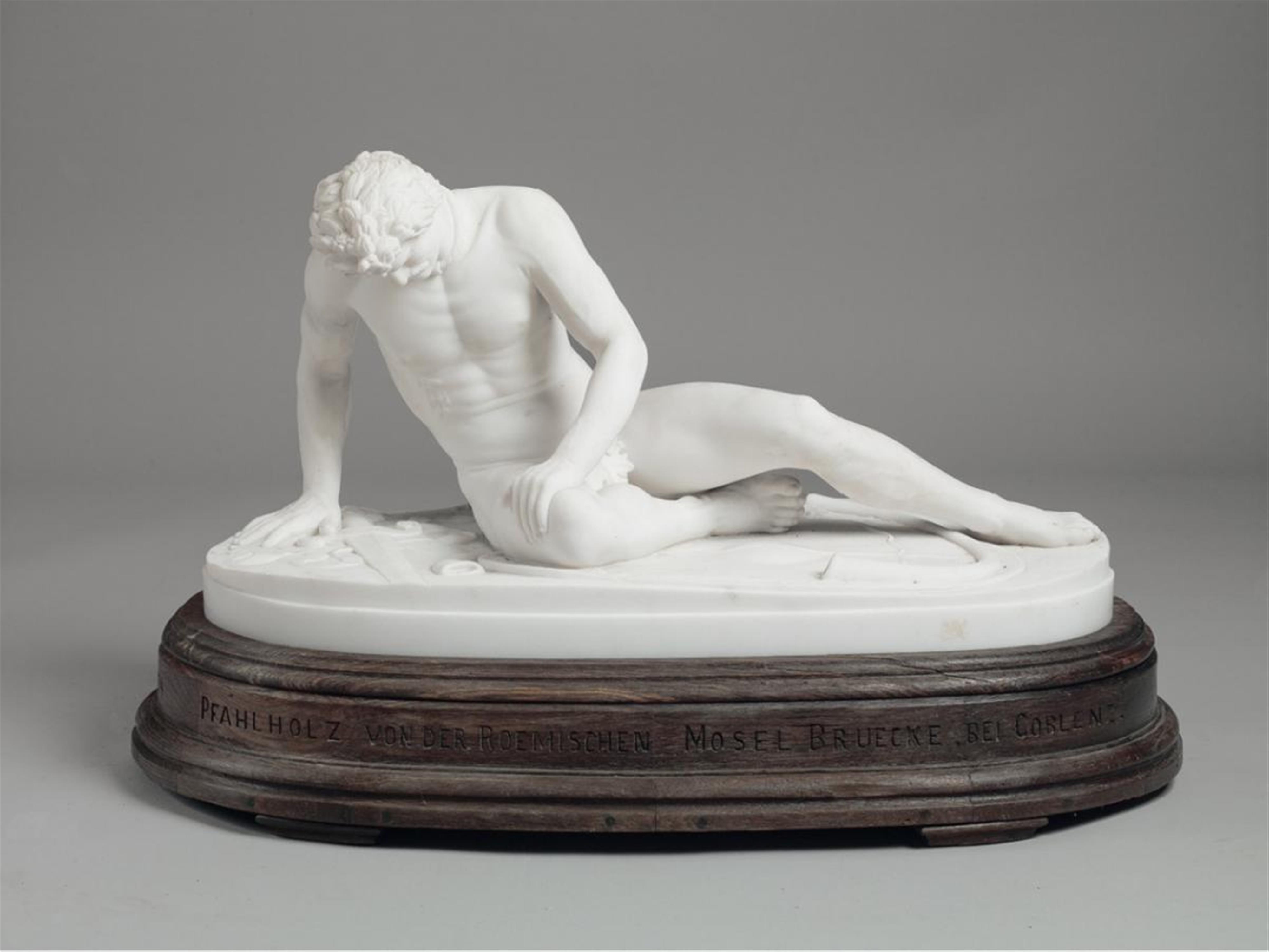 A Roman white marble and oak figure of a dying Gaul. - image-1