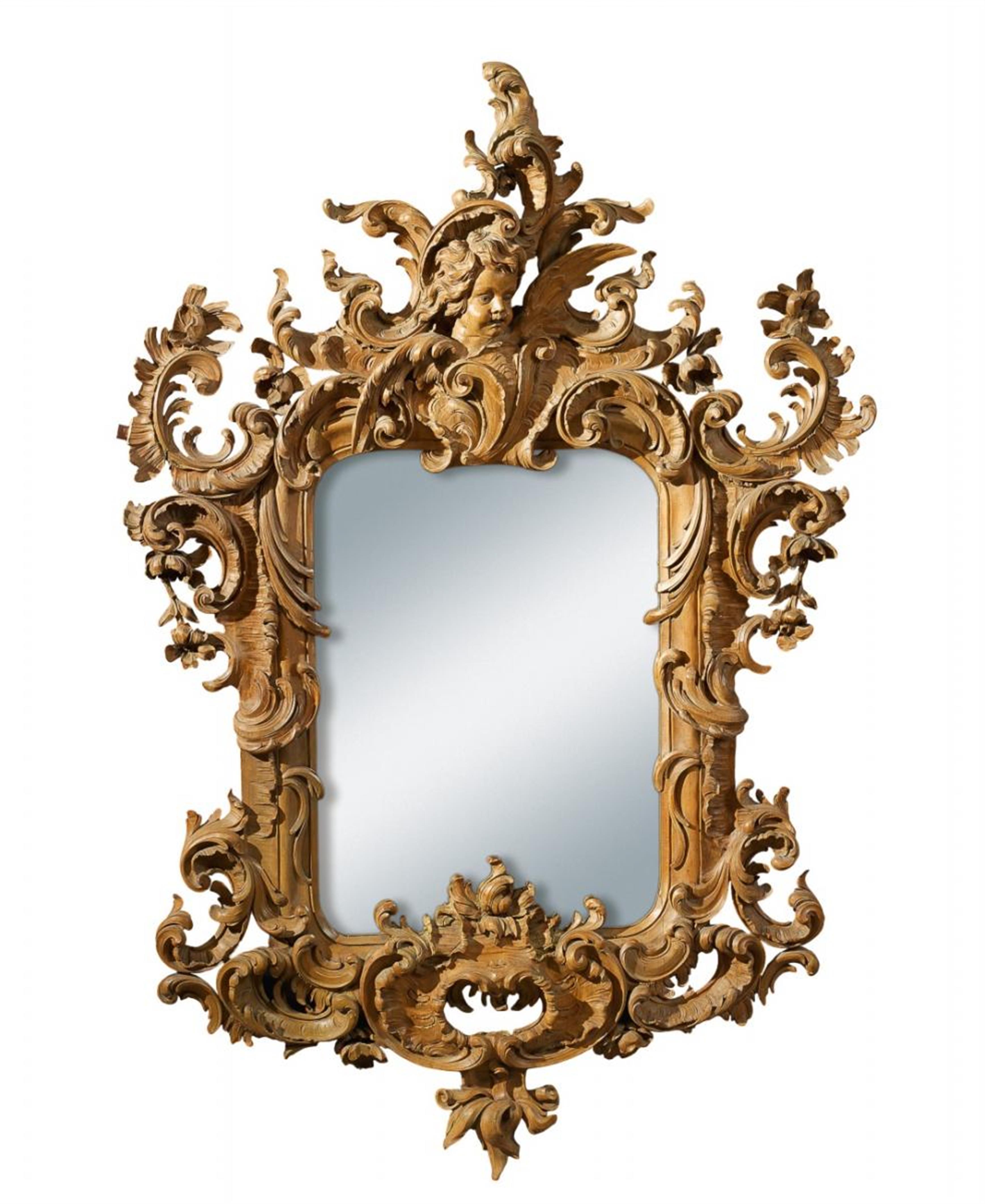 An opulent German Rococo revival carved limewood mirror. - image-1