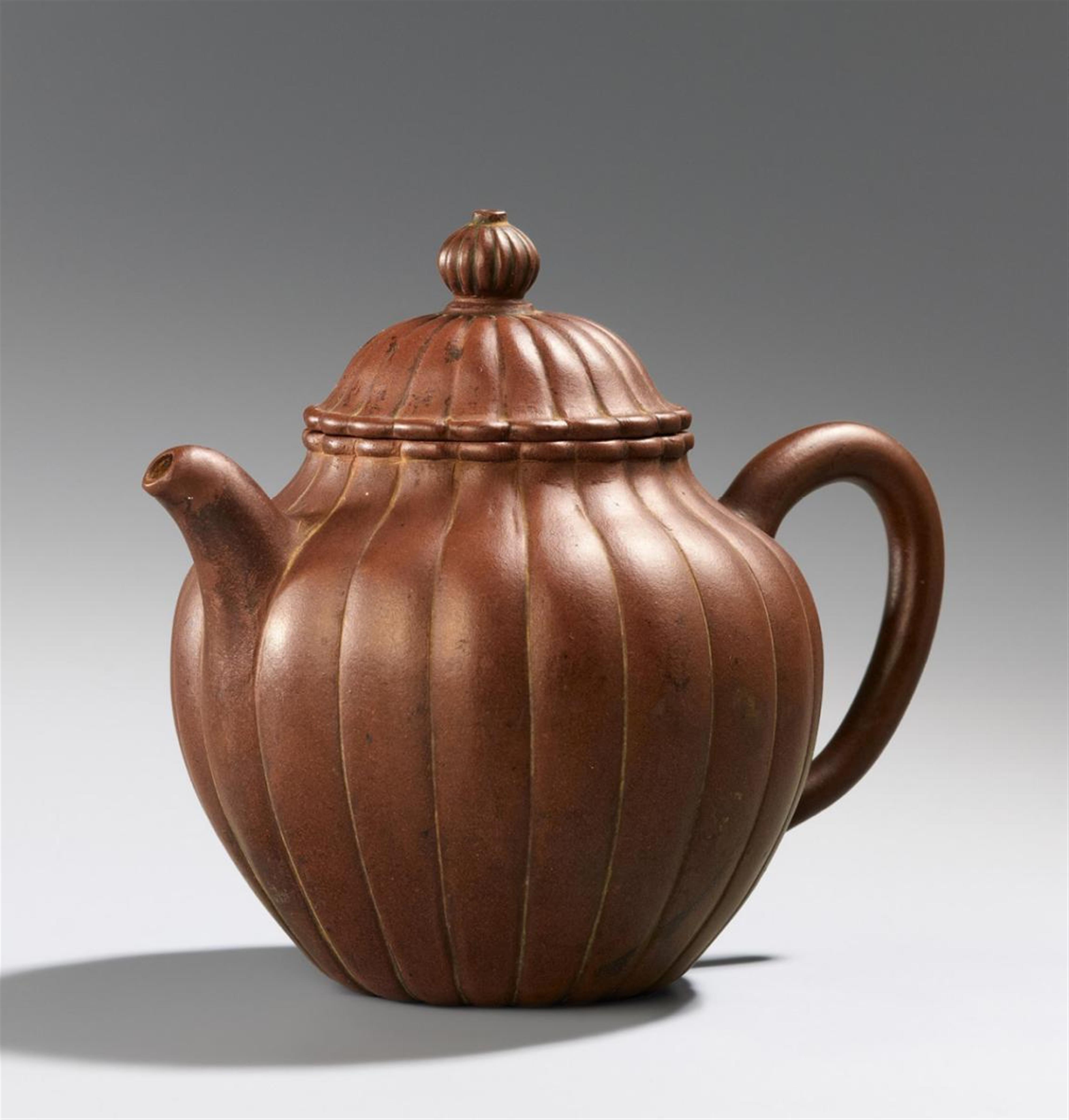 An Yixing chrysanthemum-moulded teapot and cover.18th - image-1