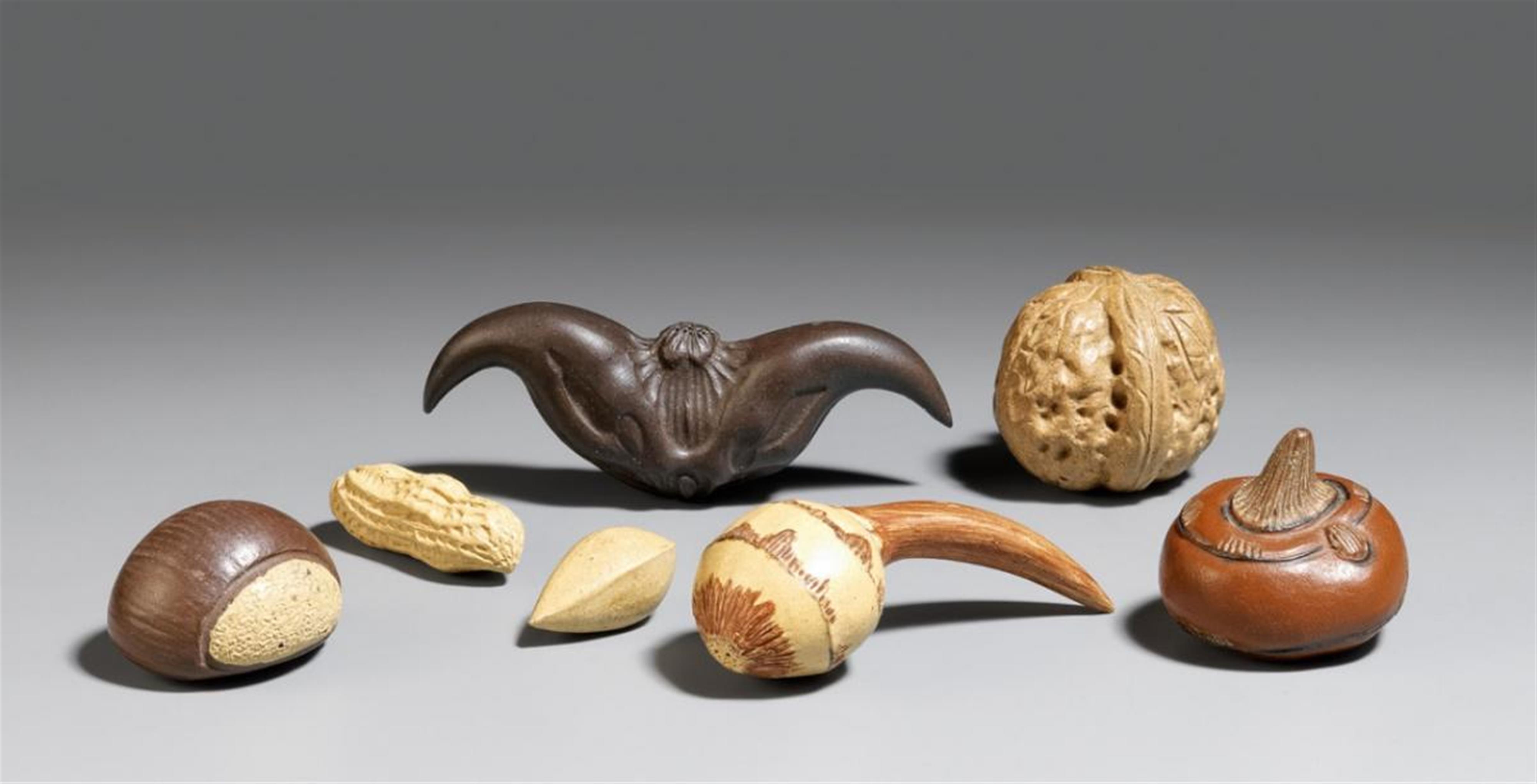 An Yixing stoneware 'fruit and nuts' group. 19th/20th century - image-1