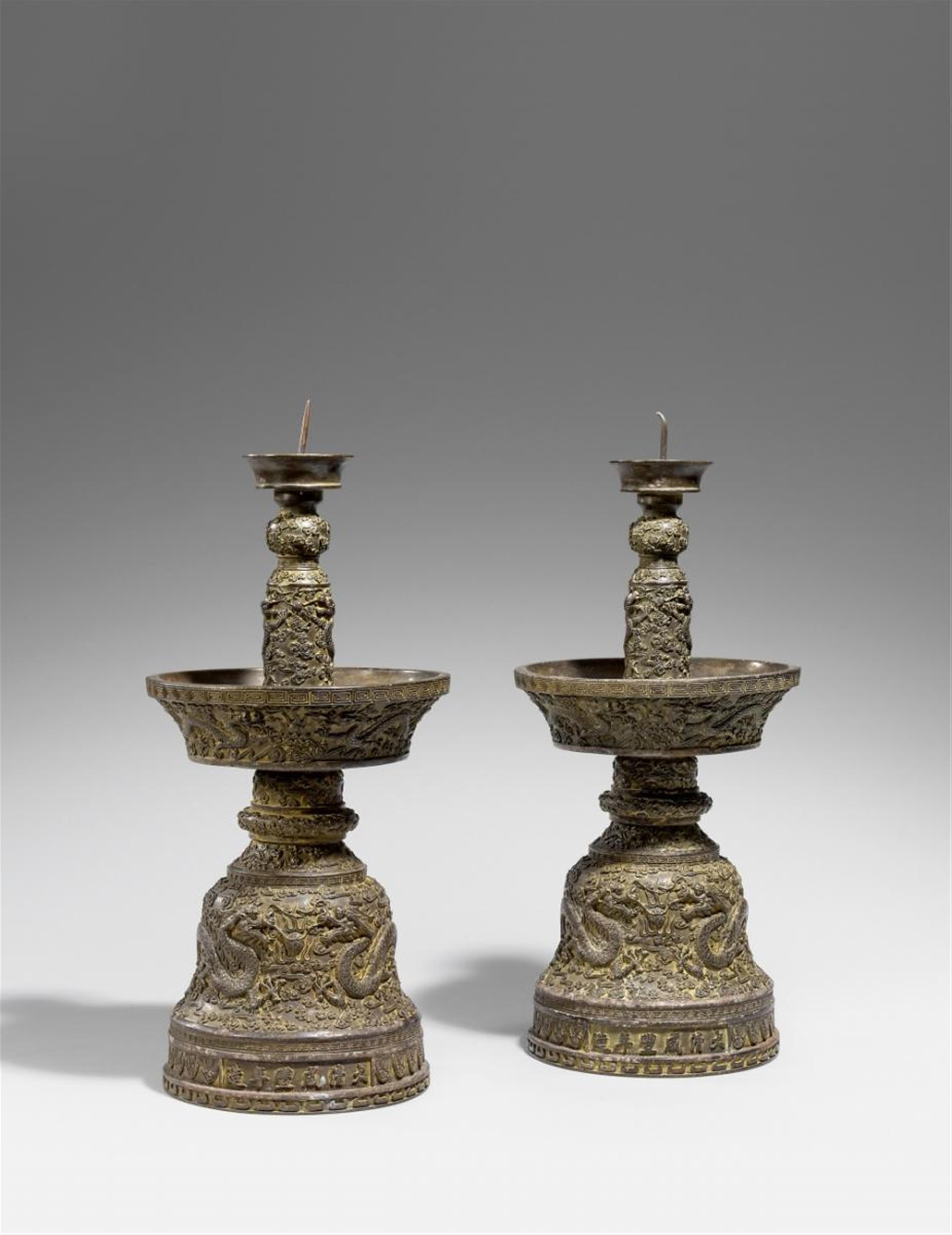 A pair of bronze candle sticks. Xianfeng and possibly of the period - image-1