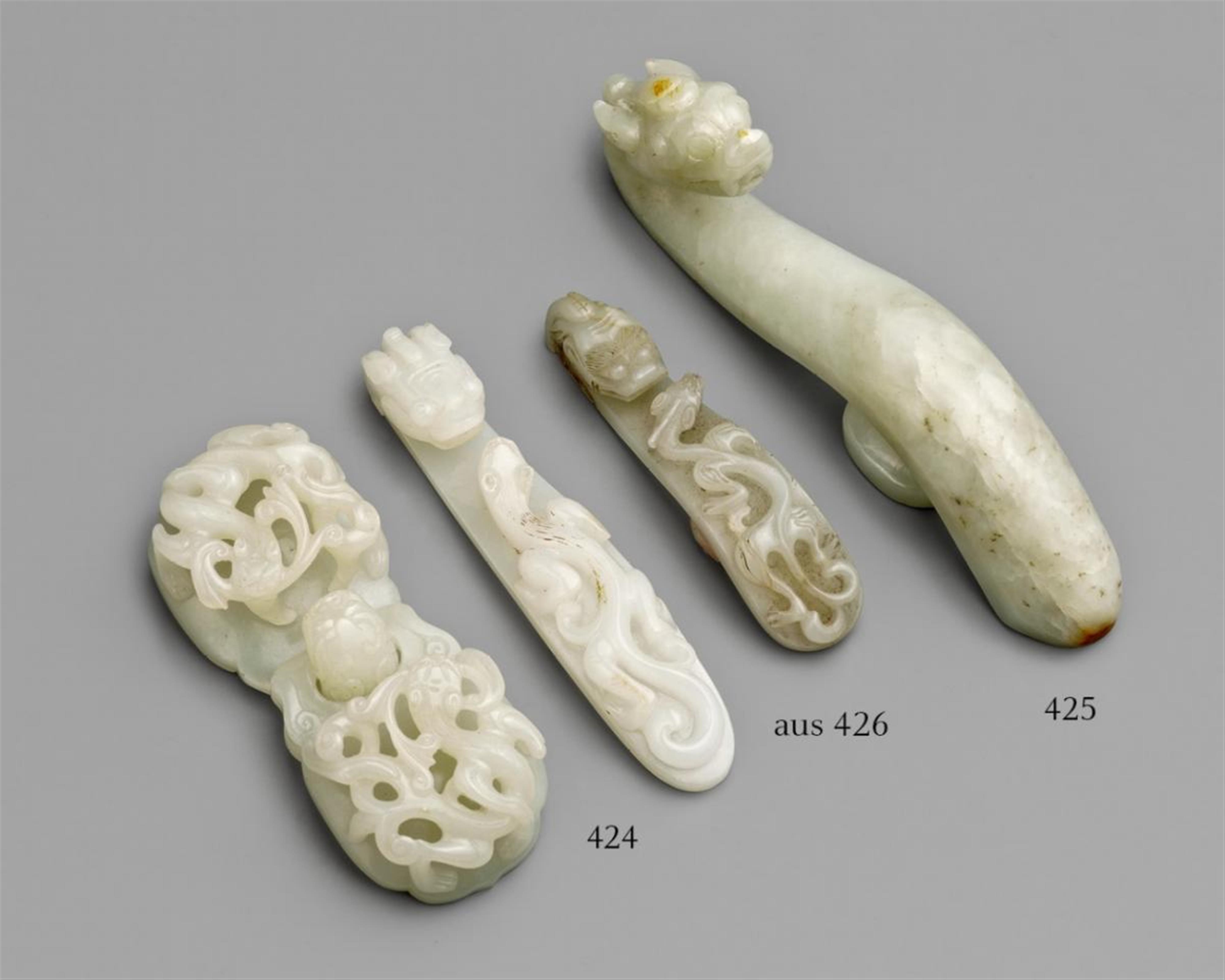 A large white-grey jade belt hook - image-1