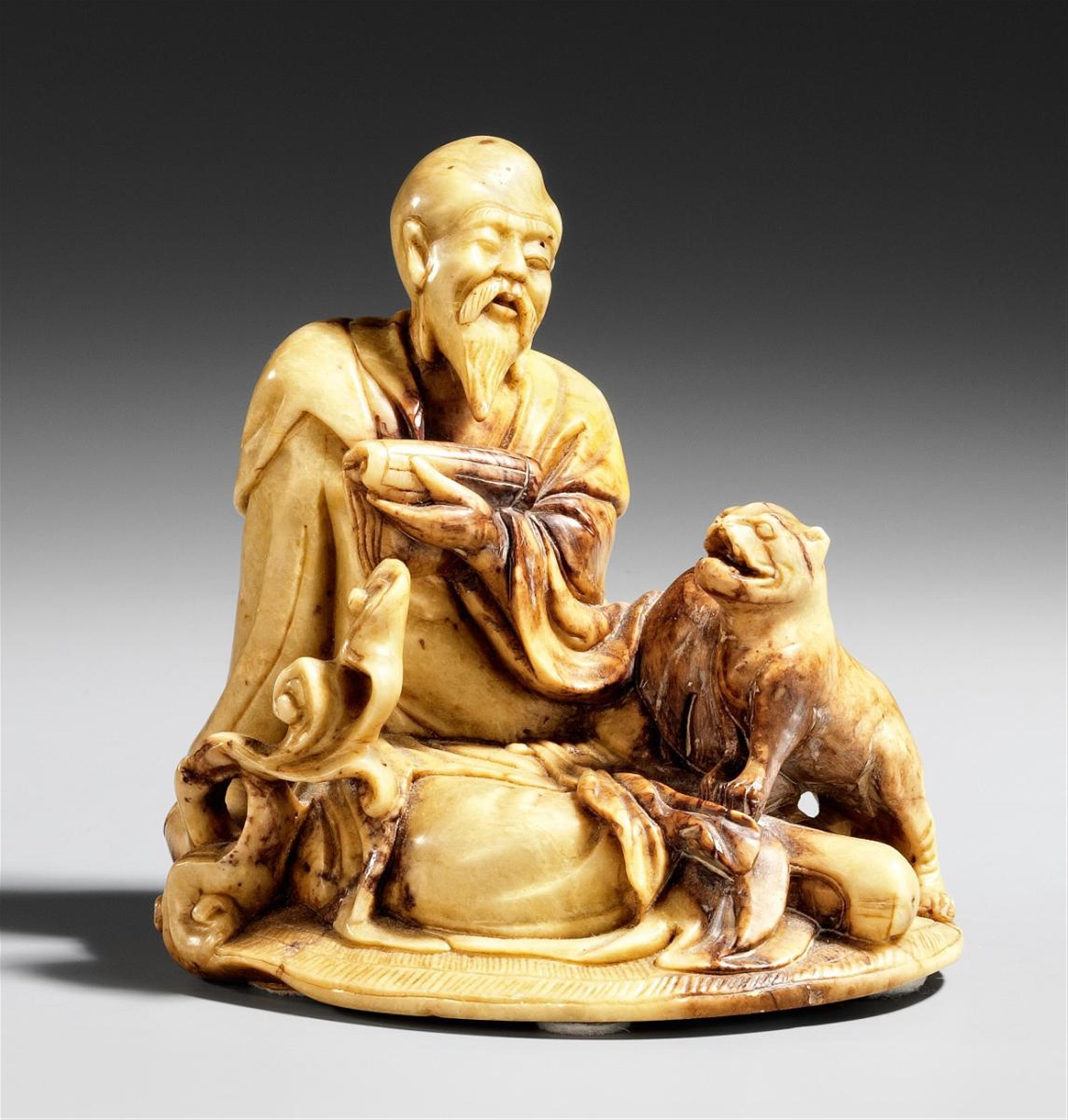 Soapstone carving of an immortal and tiger. Late 19th century - image-1