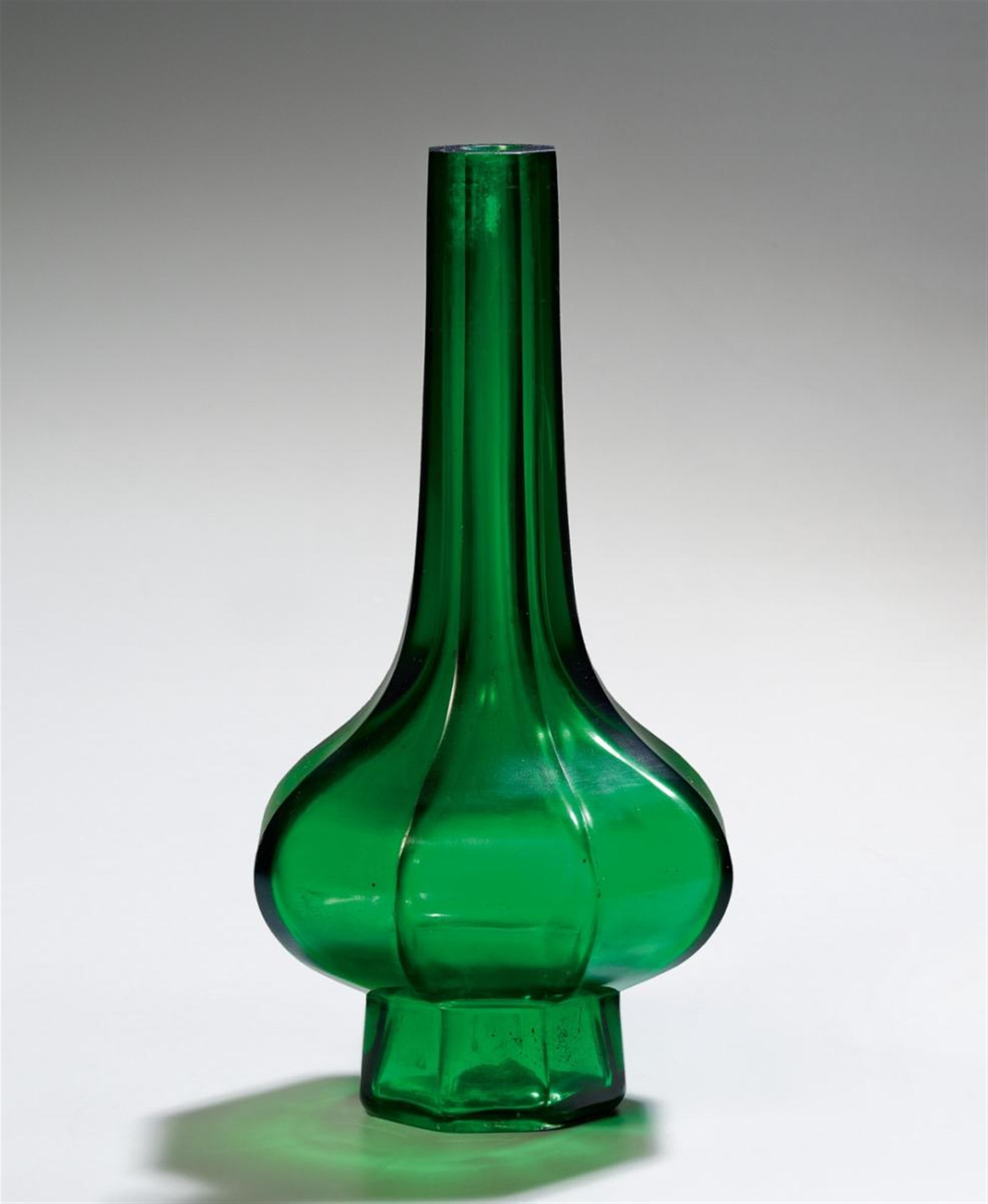 A transparent bottle-green glass vase. 19th century - image-1