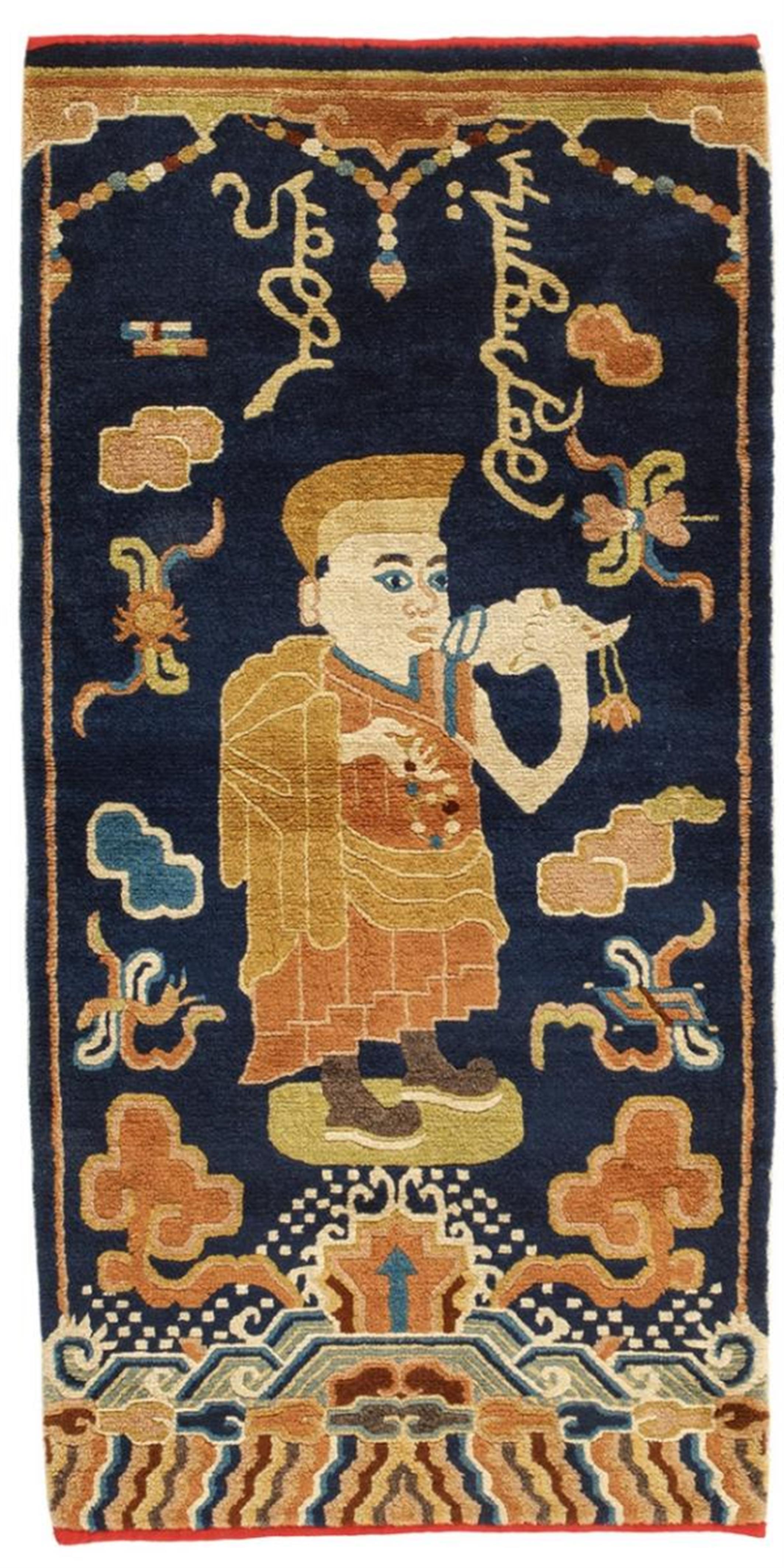A wool Ningxia carpet displaying a Lamaist monk. Late 19th century - image-1