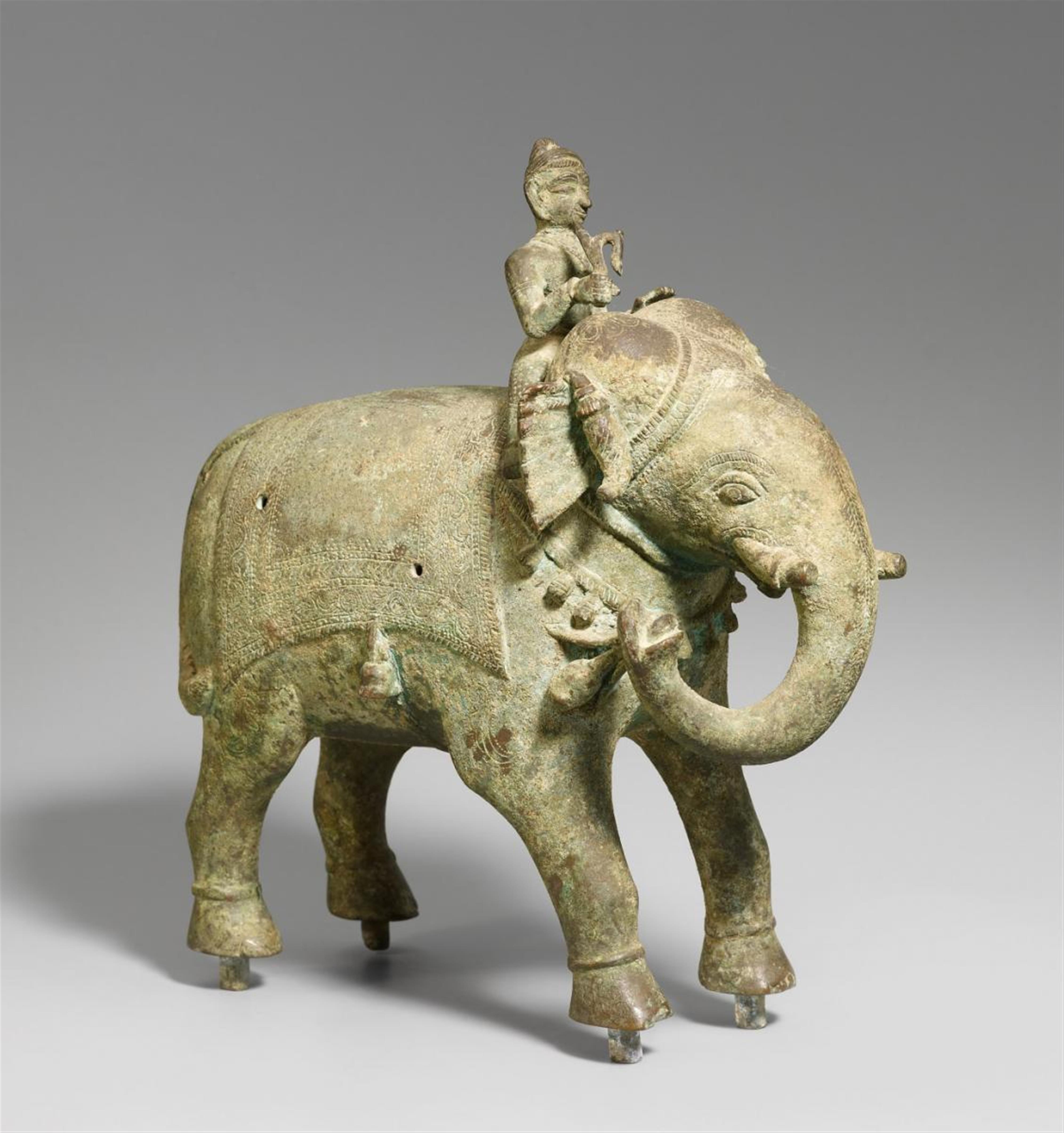 An Indian bronze elephant and mahout - image-1