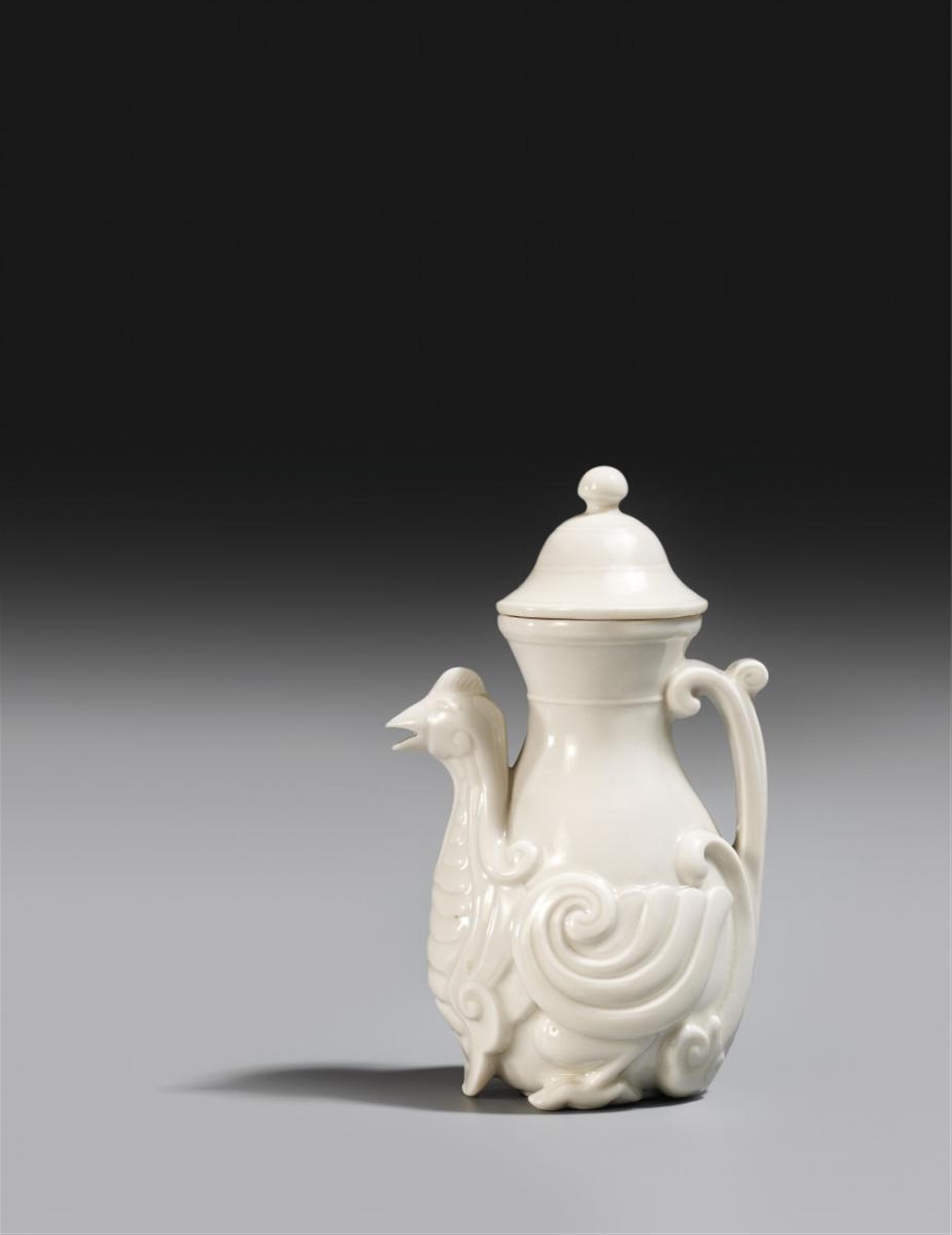 A rare small blanc-de-Chine phoenix-form ewer and cover. Impressed mark He Chaochun. Dehua. Kangxi period (1662–1722) - image-1