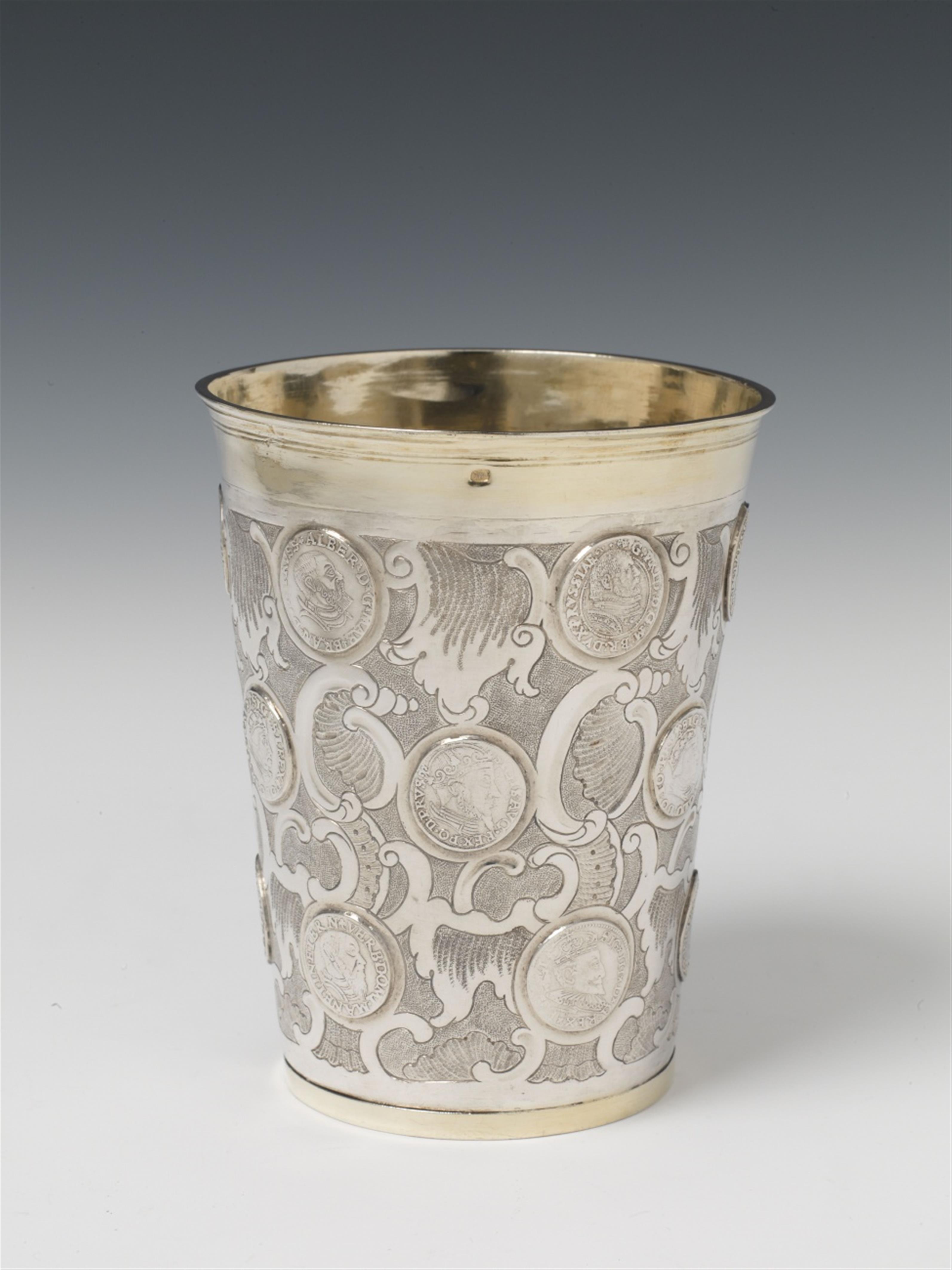 A large Berlin silver partially gilt coin-set beaker. With 18 Baltic, Brandenburg and Silesian coins of the 16th century and a Brandenburg taler dated 1692 with a portrait of Elector Frederick III to the underside. Marks of Joachim II Hübener, 1747 - 57. - image-1