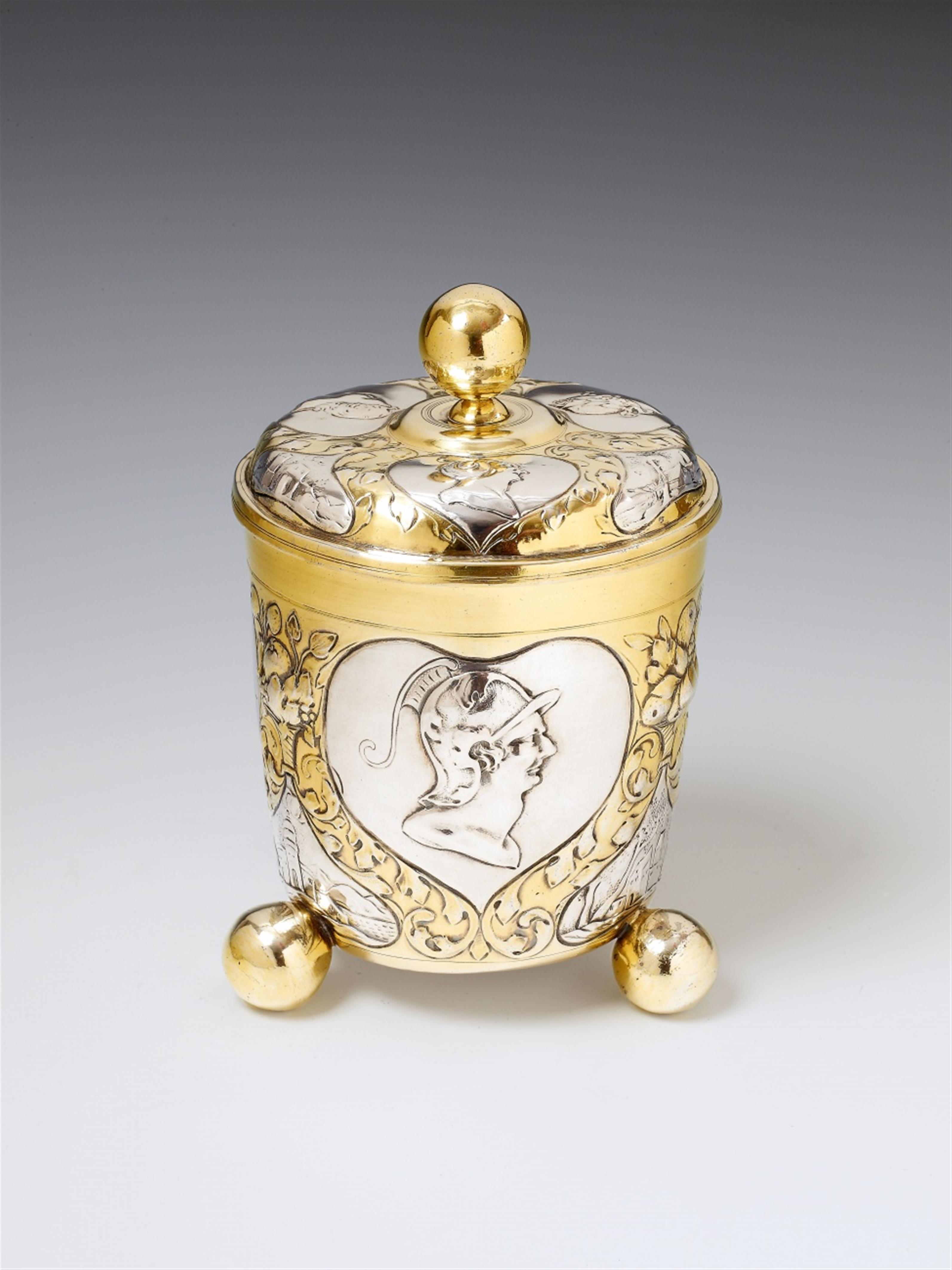 A large Augsburg silver partially gilt covered beaker. Marks of Simon Wickert, 1689 - 92. - image-1