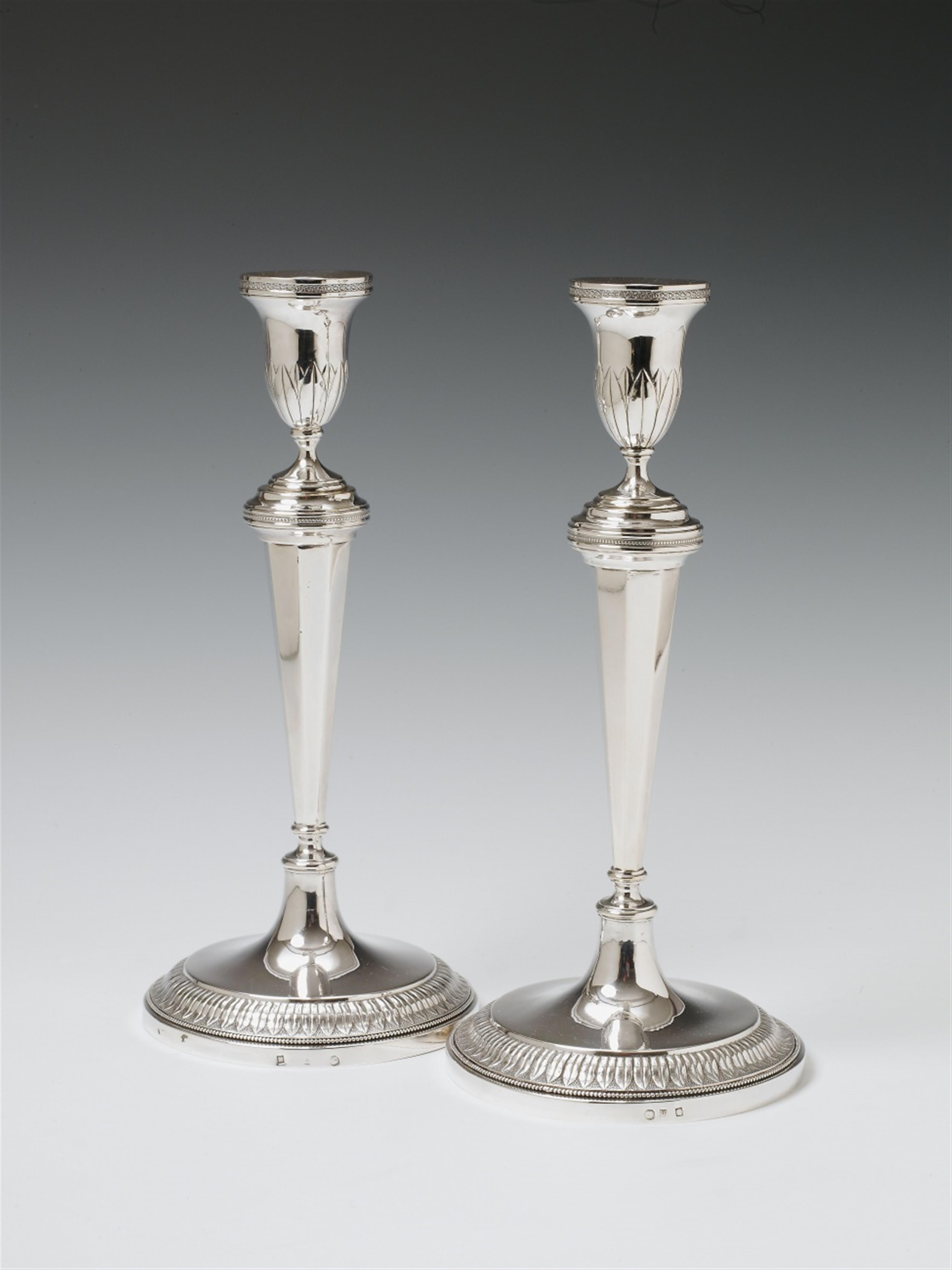 A pair of Antwerp silver candlesticks. With a small monogram "CCVK" to the base. Marks of P. L. Dandelooy, ca. 1840. - image-1