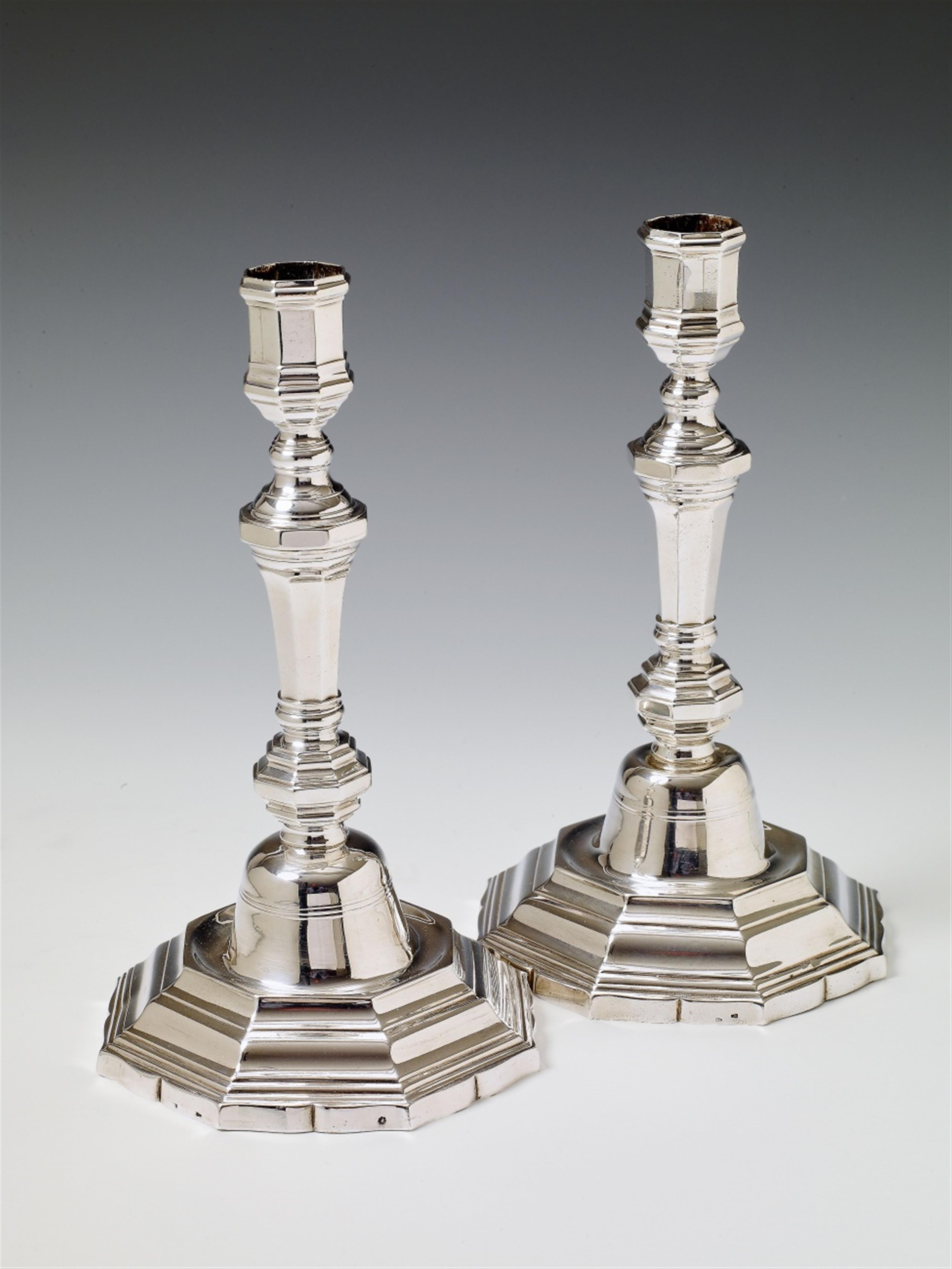 A pair of rare Montreuil silver candlesticks. One with a restoration to the inside of the base. Marks of Charles-Nicolas Gobert, ca. 1750. - image-1