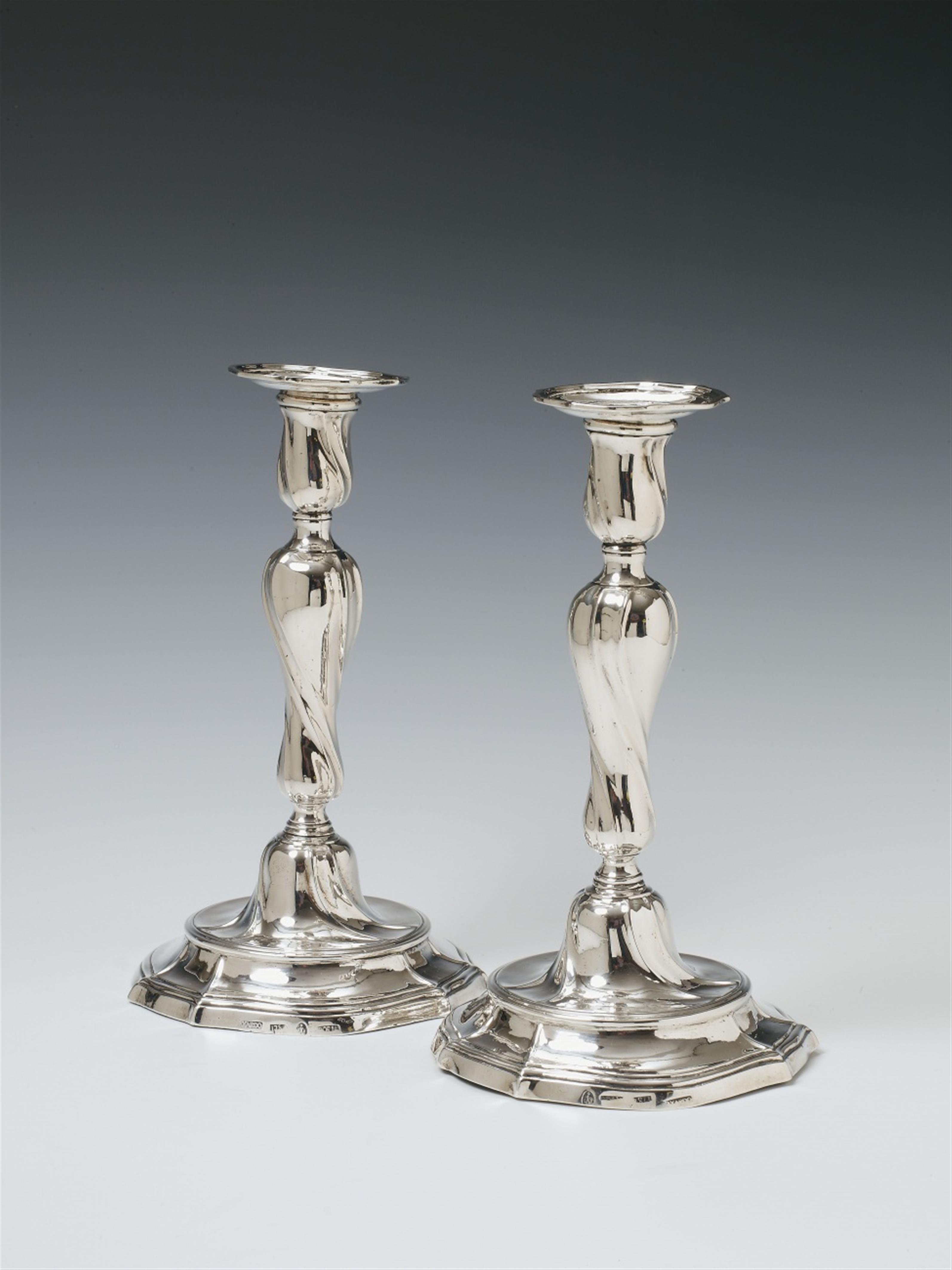 A pair of Spanish rococo silver candlesticks. One very slightly dented. Unidentified maker's mark "DORIA", Cadiz/Andalusia, 1784. - image-1