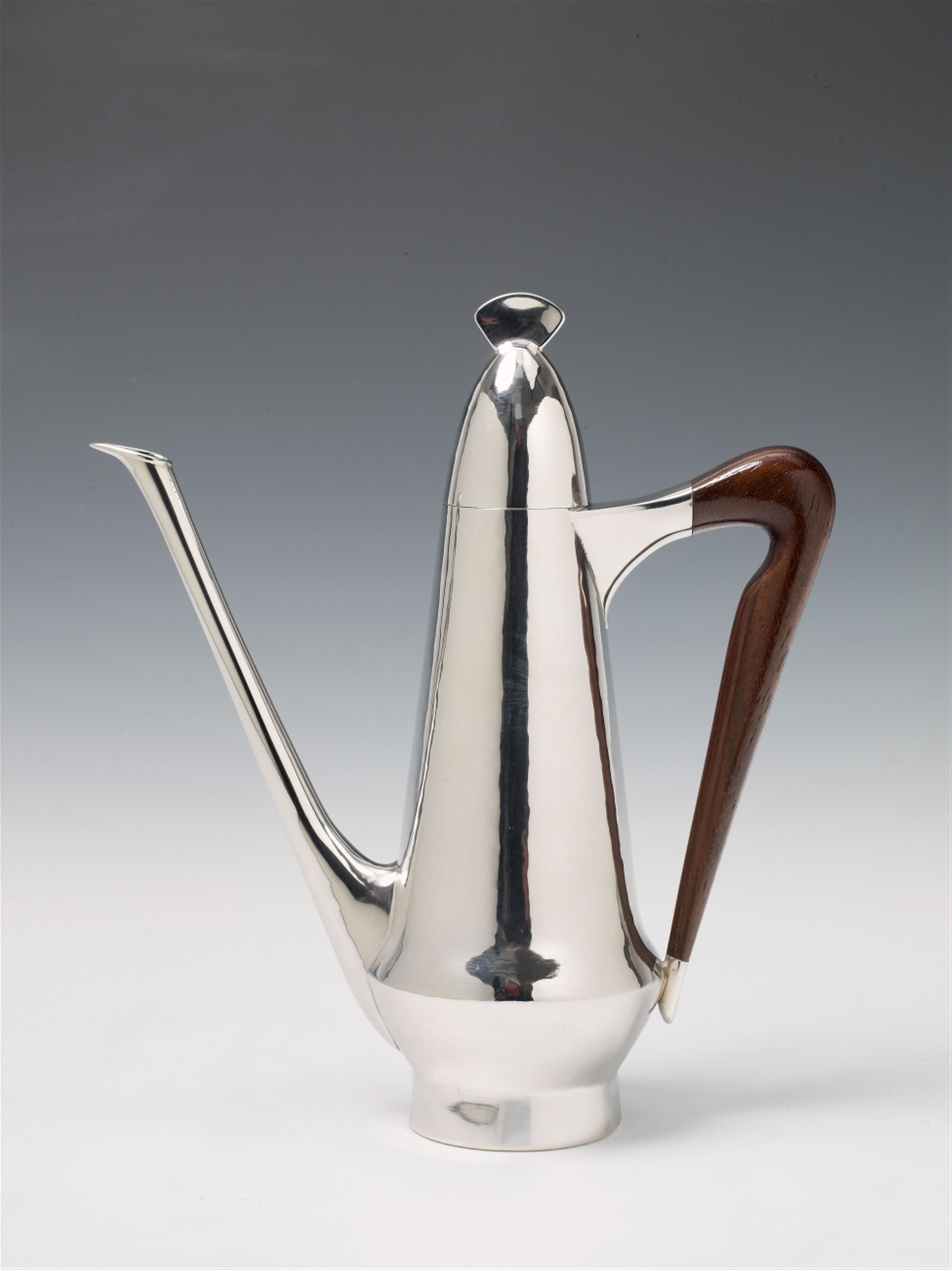 A Cologne silver interior gilt mocca pot. The handle of wood. Marks of Wilhelm Nagel, 1954. - image-1