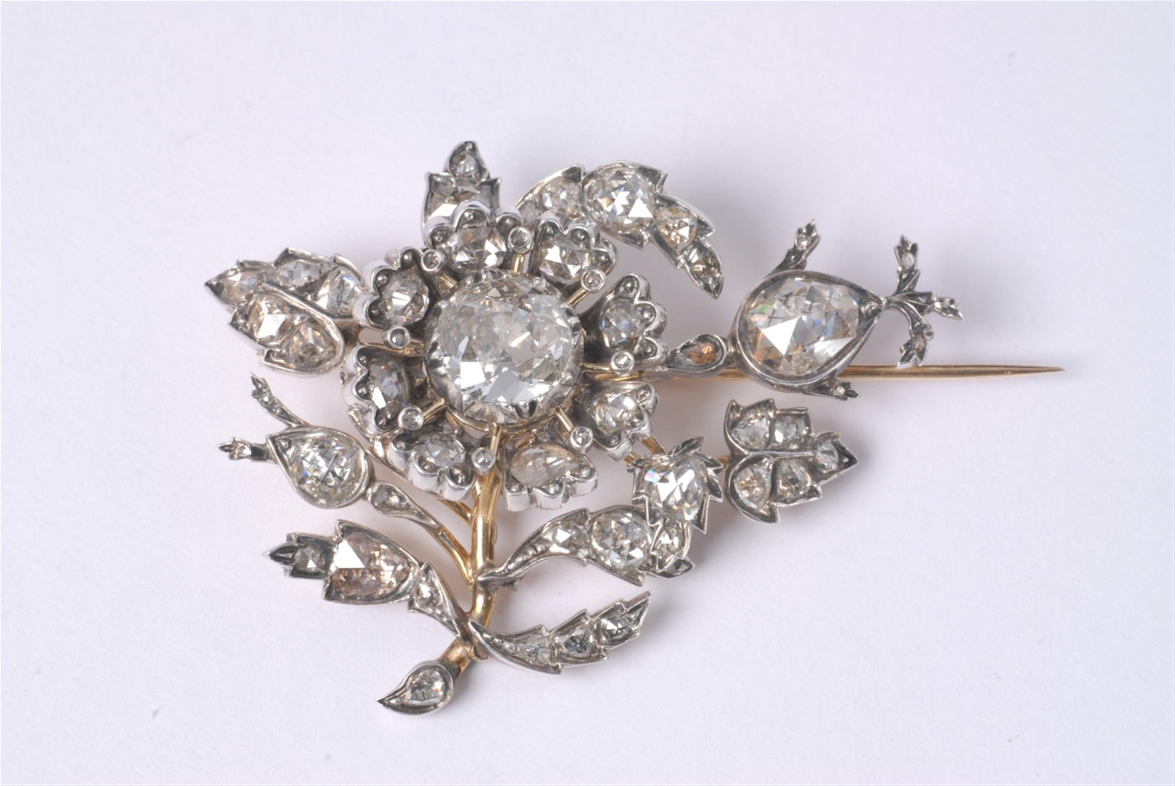 An 18k gold, silver and diamond trembleuse brooch - image-1