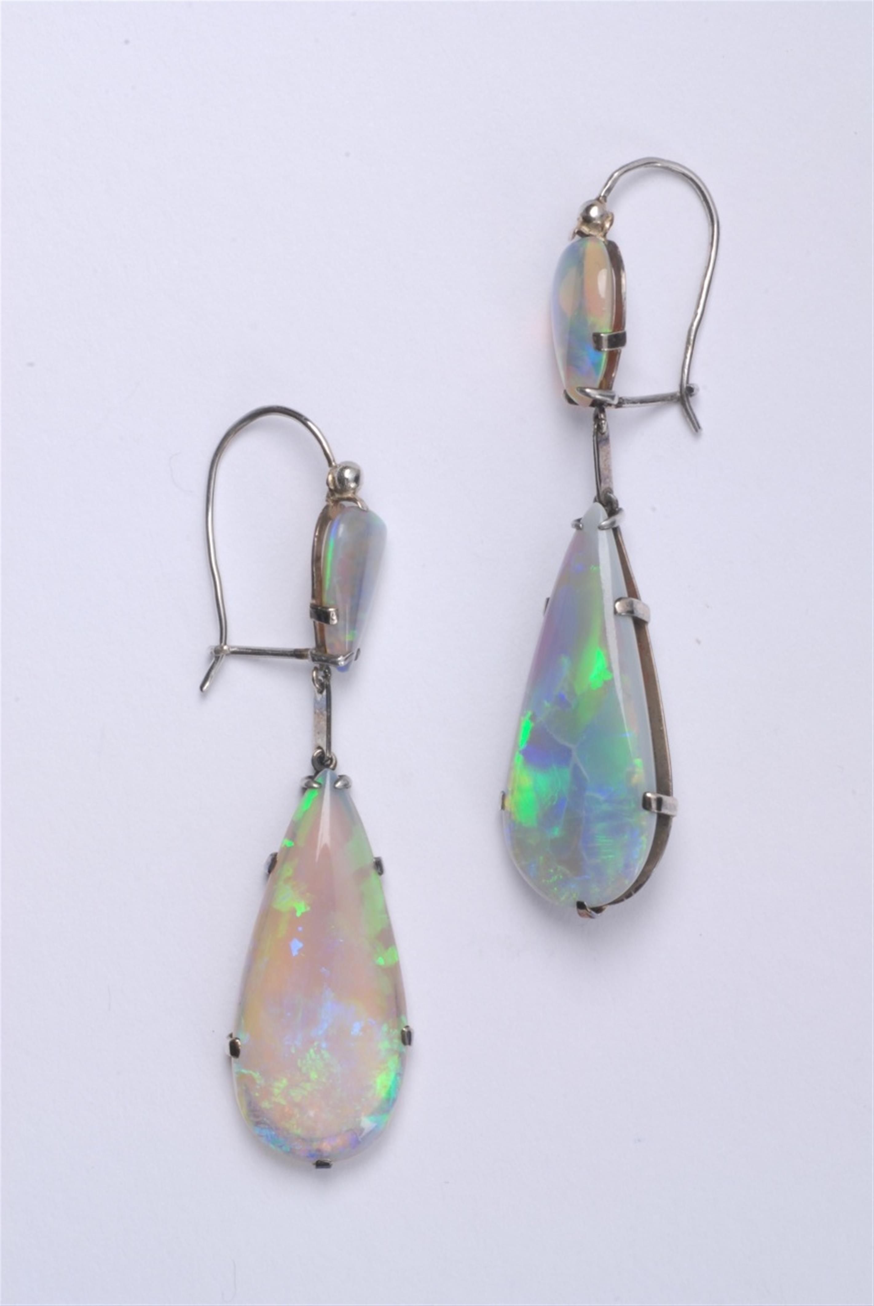 A pair of 8k gold and opal pendant earrings. - image-1