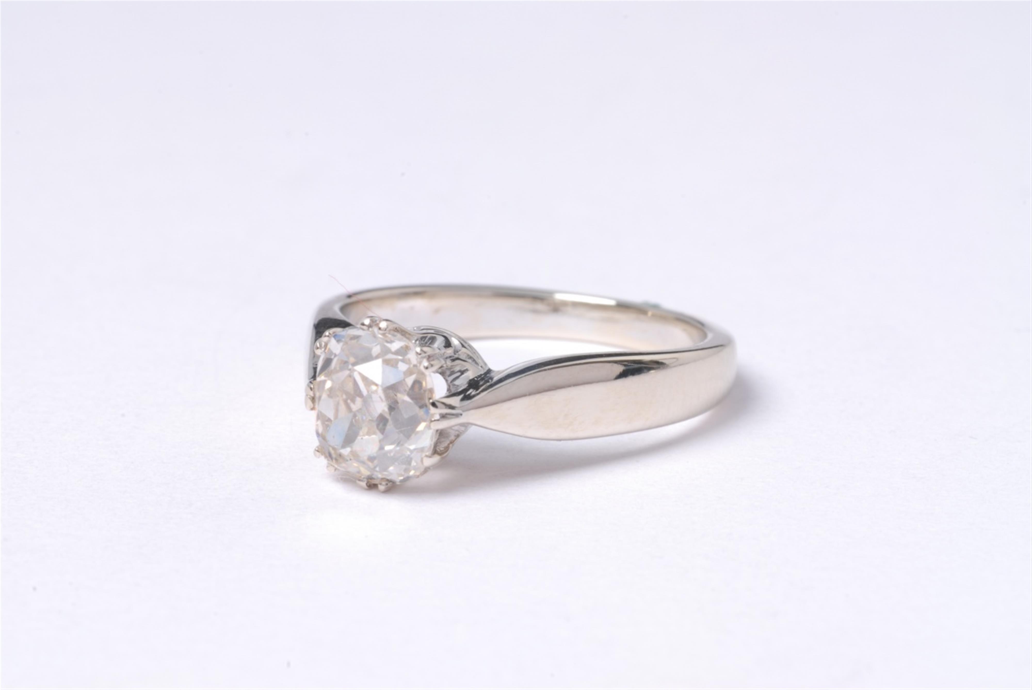 A 14k white gold and diamond solitaire ring. - image-1