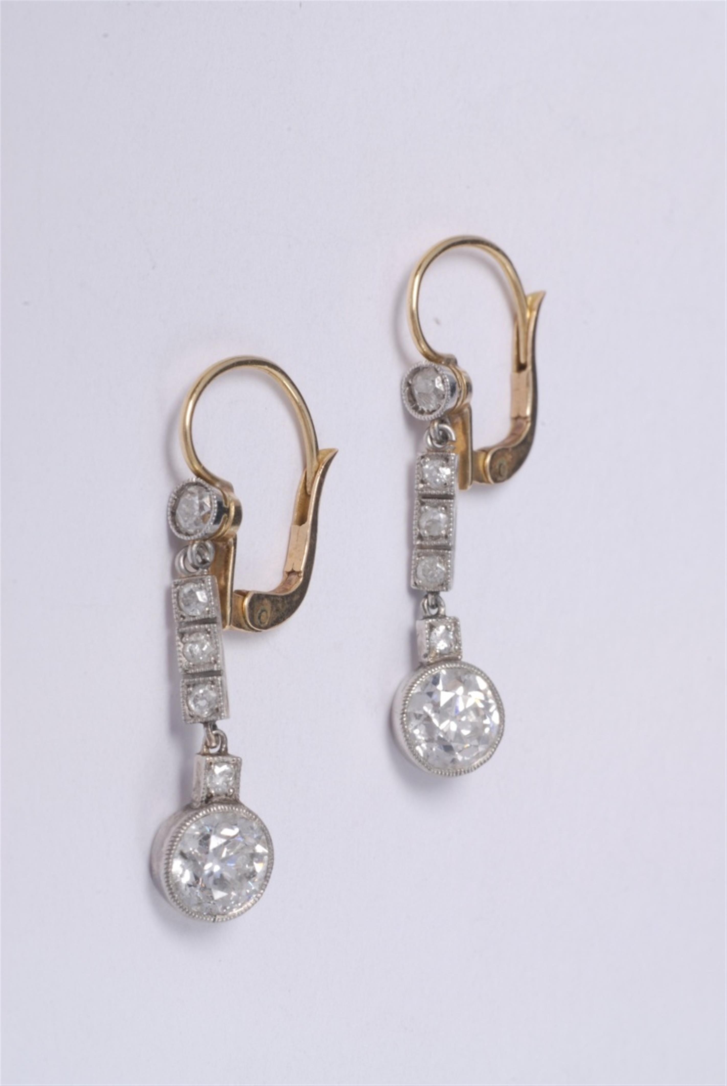 A pair of 18k gold, platinum and diamond art déco pendant earrings - image-1