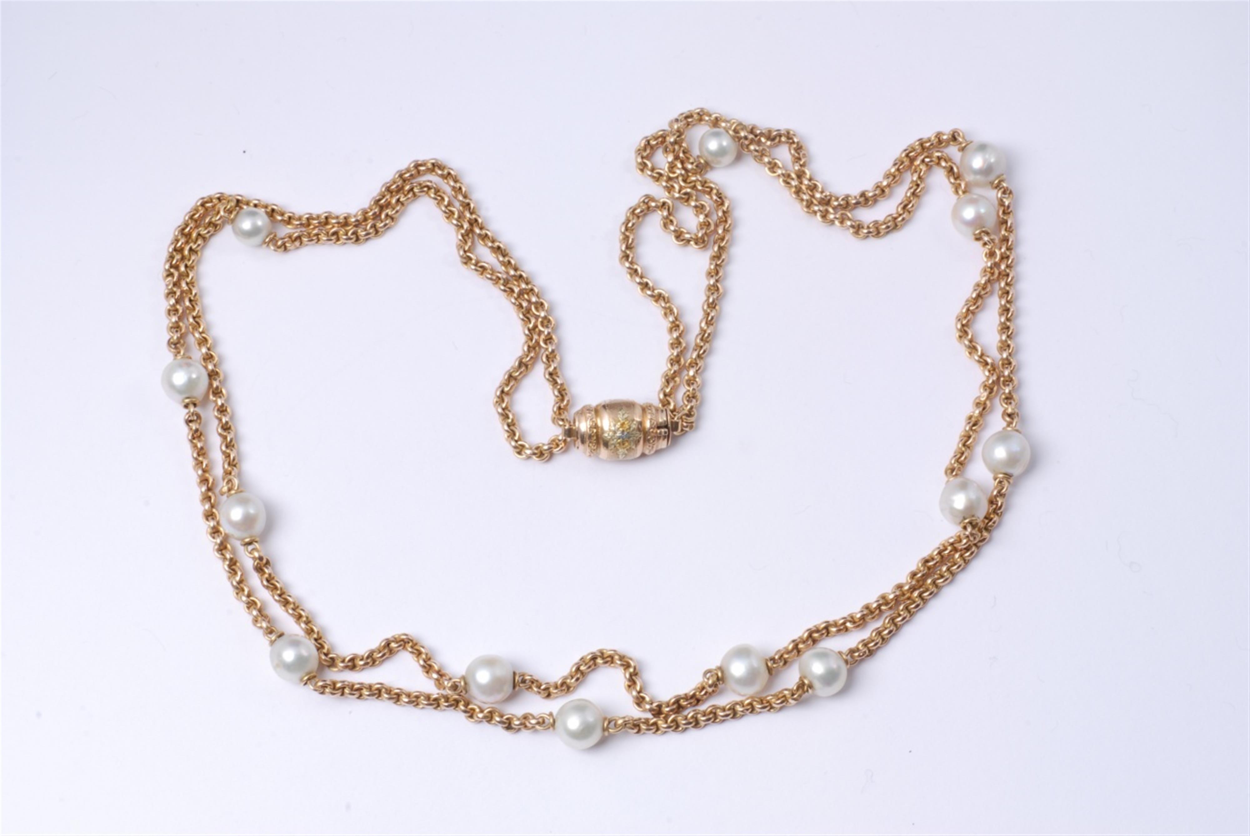 An 18k gold chain necklace with pearls. - image-1