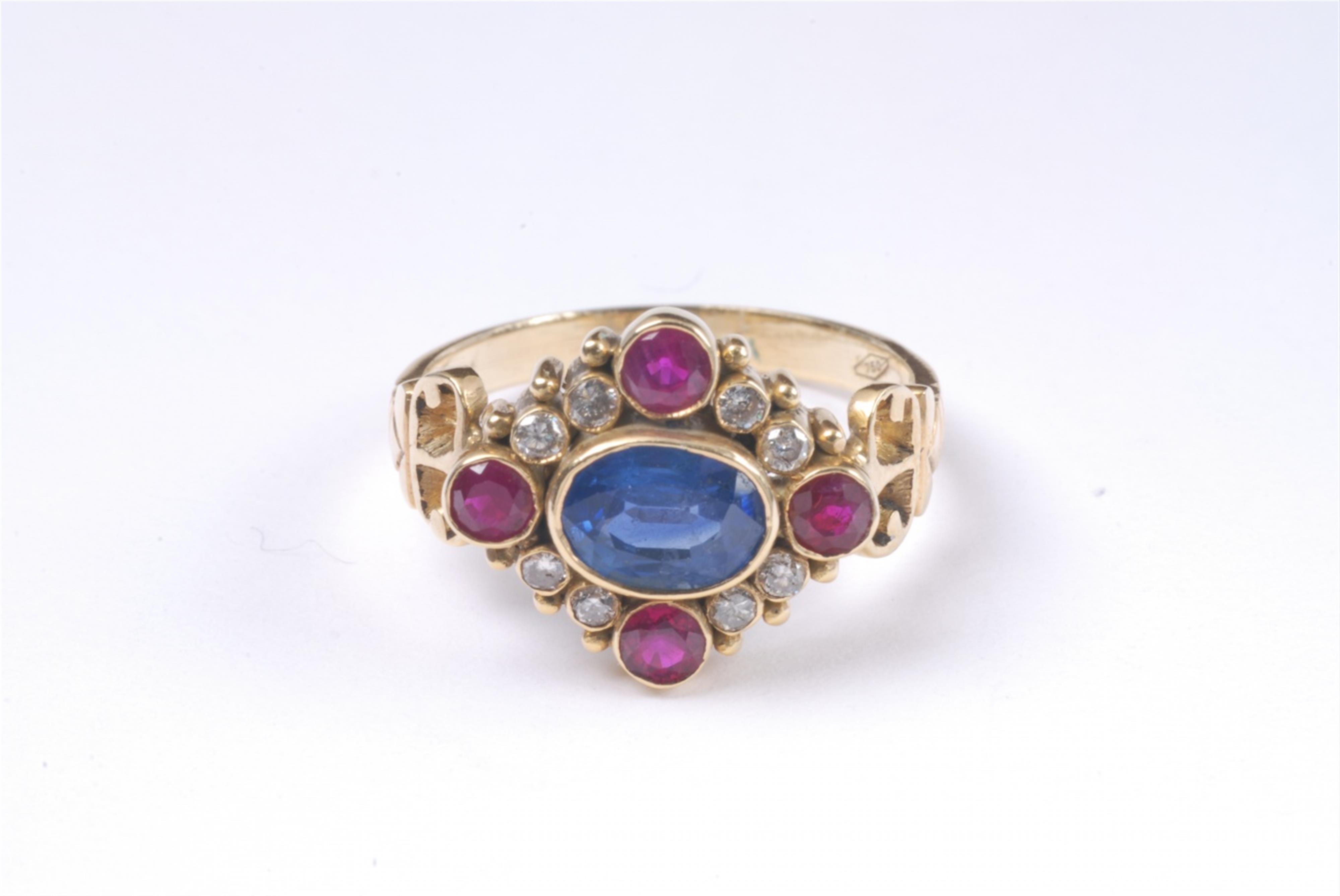 An 18k gold, sapphire and ruby ring. - image-1