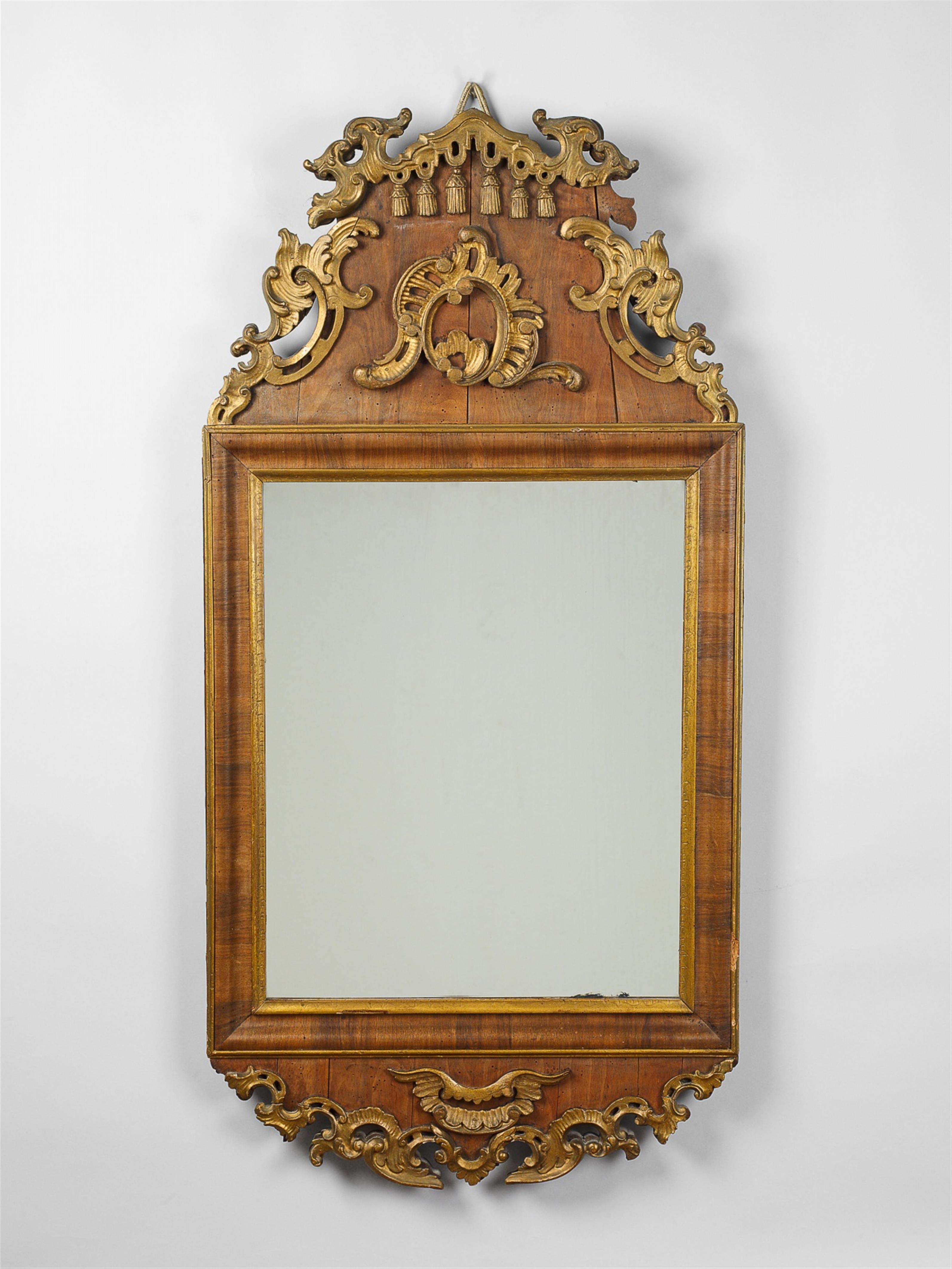 A small German or Scandinavian walnut veneered softwood mirror with gilt relief appliques. - image-2