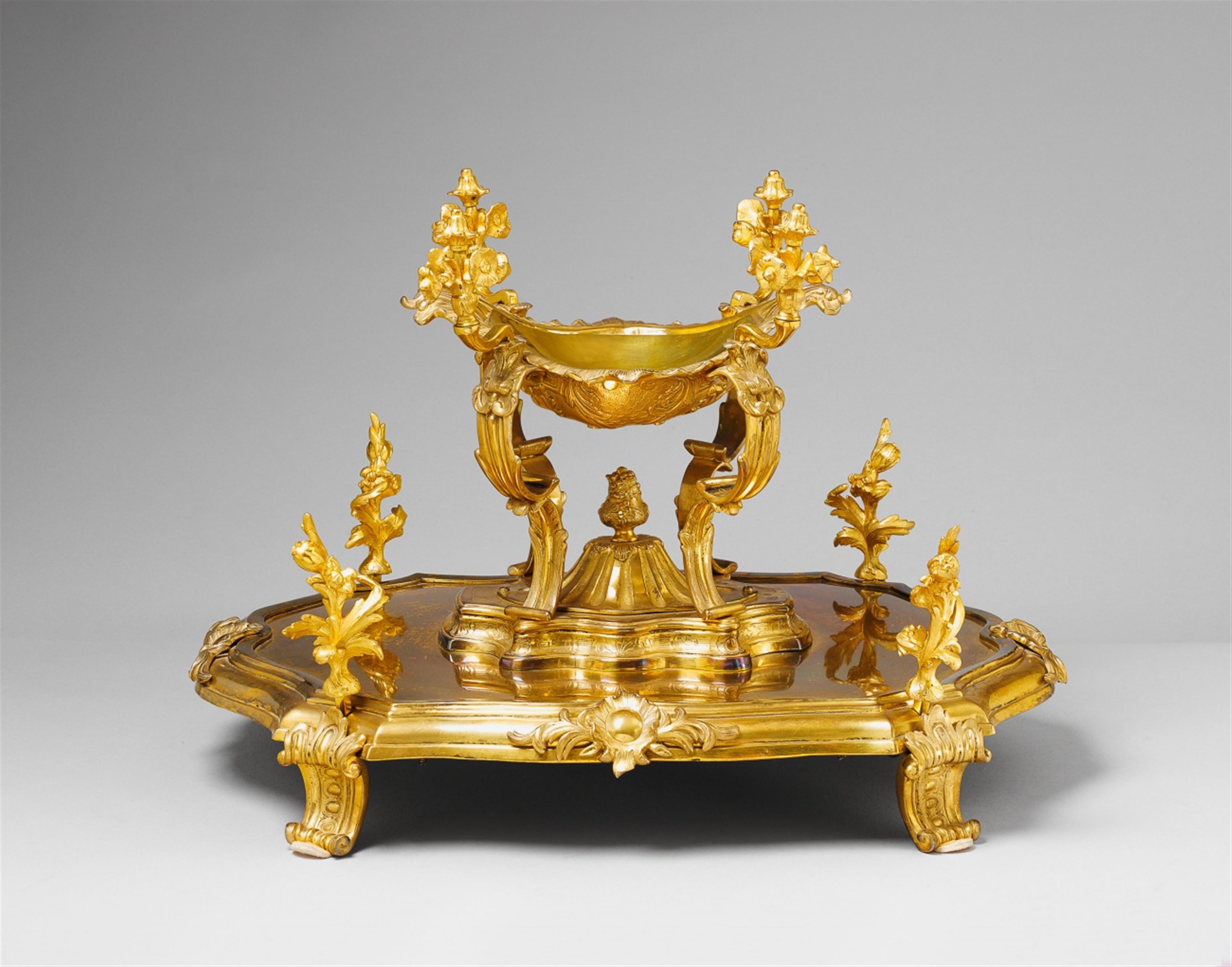 A gilt bronze table centrepiece. - image-1