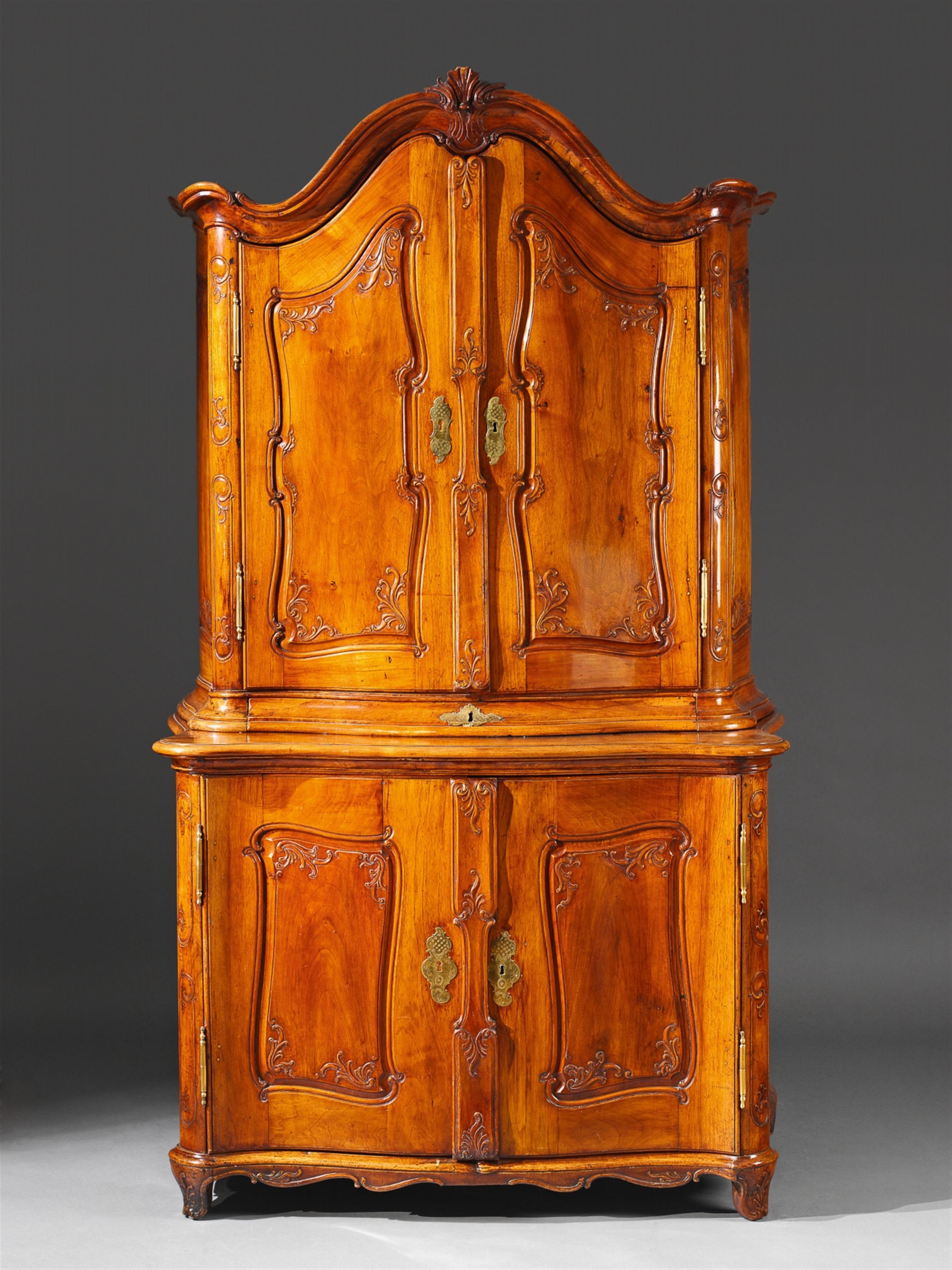 A brass mounted carved walnut Mosel region cabinet. - image-1