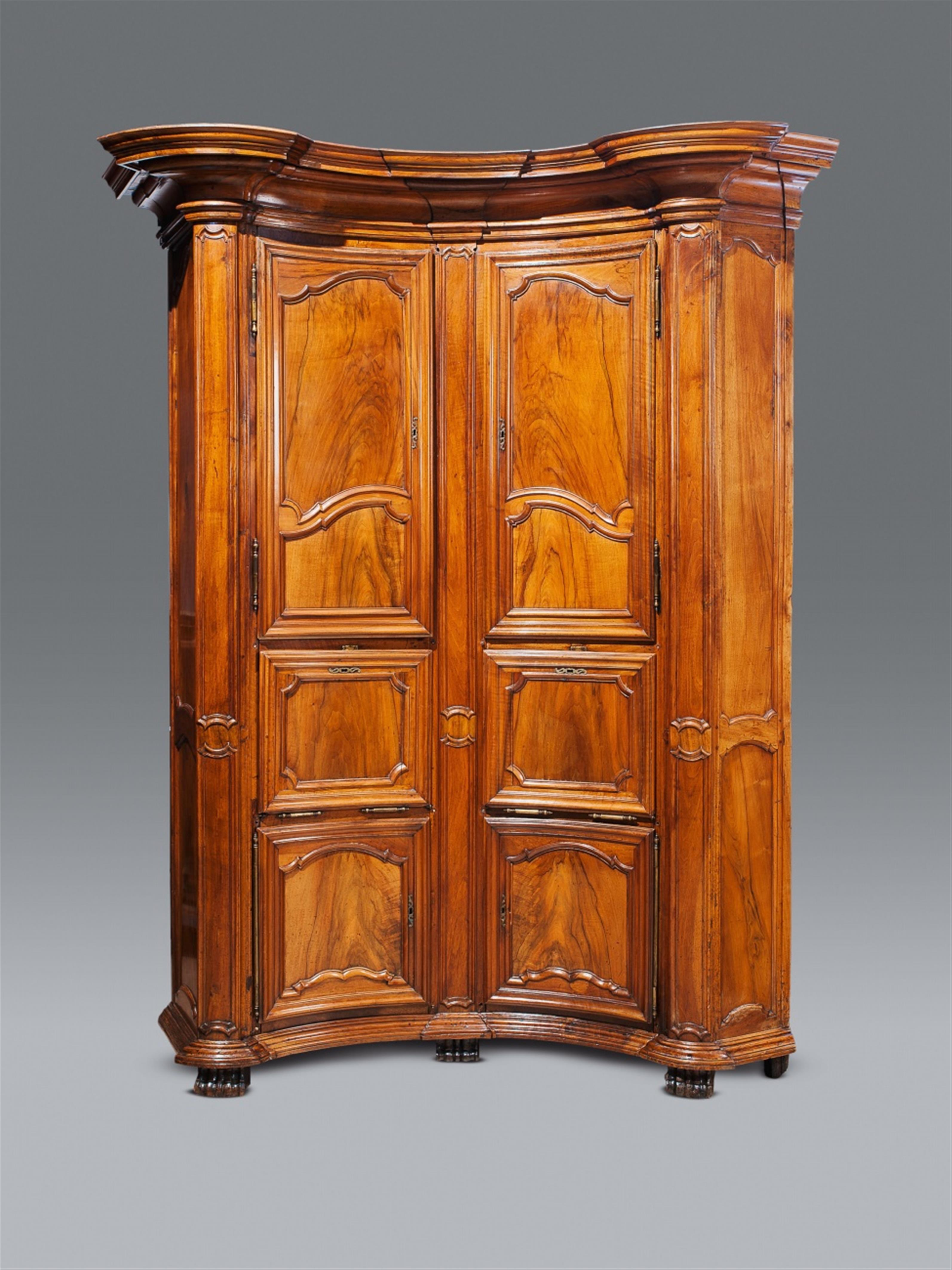 A large brass mounted walnut Burgundian "encoignure" corner cabinet. - image-1