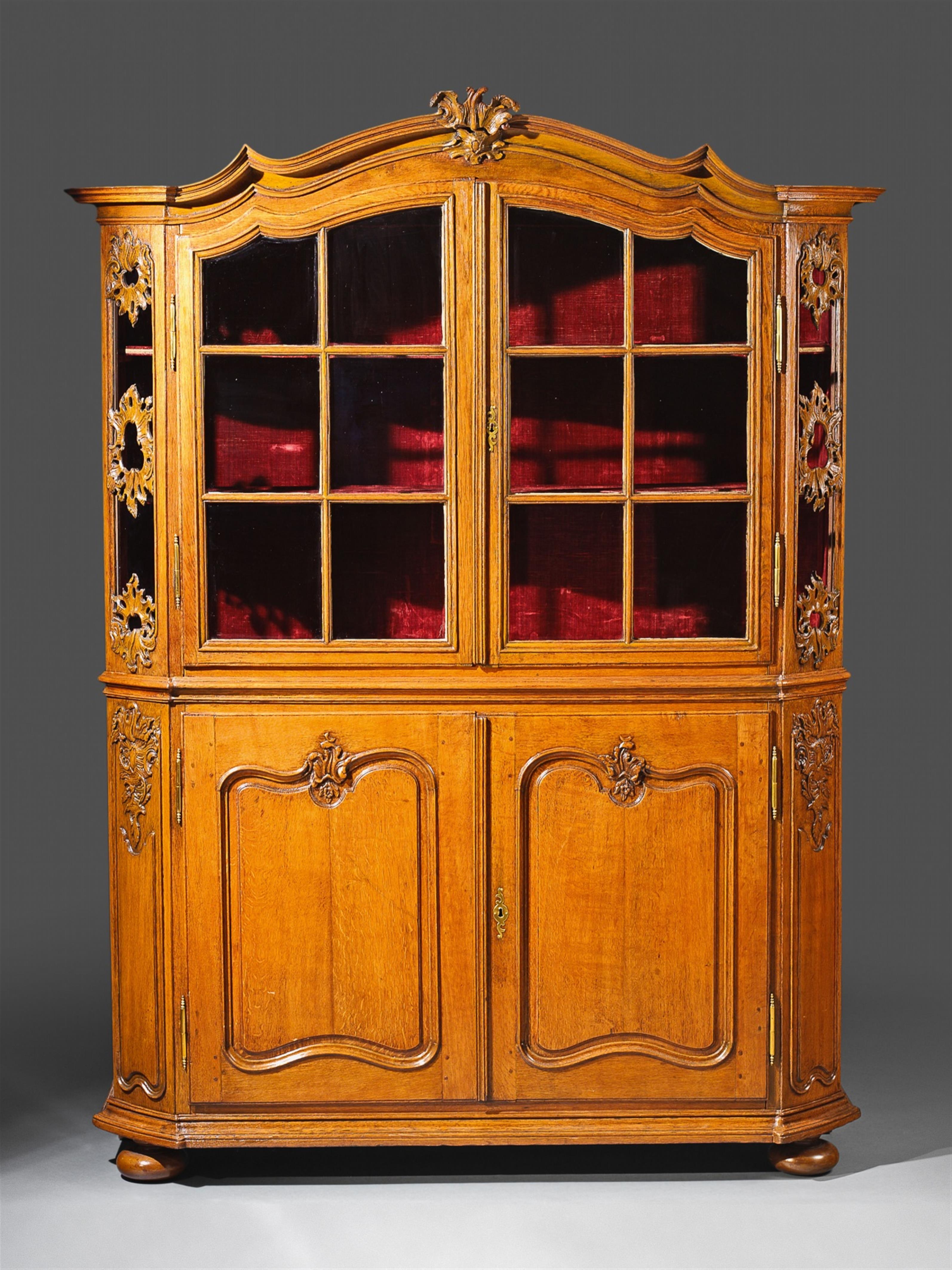 An Aachen brass mounted carved oak display cabinet. - image-1