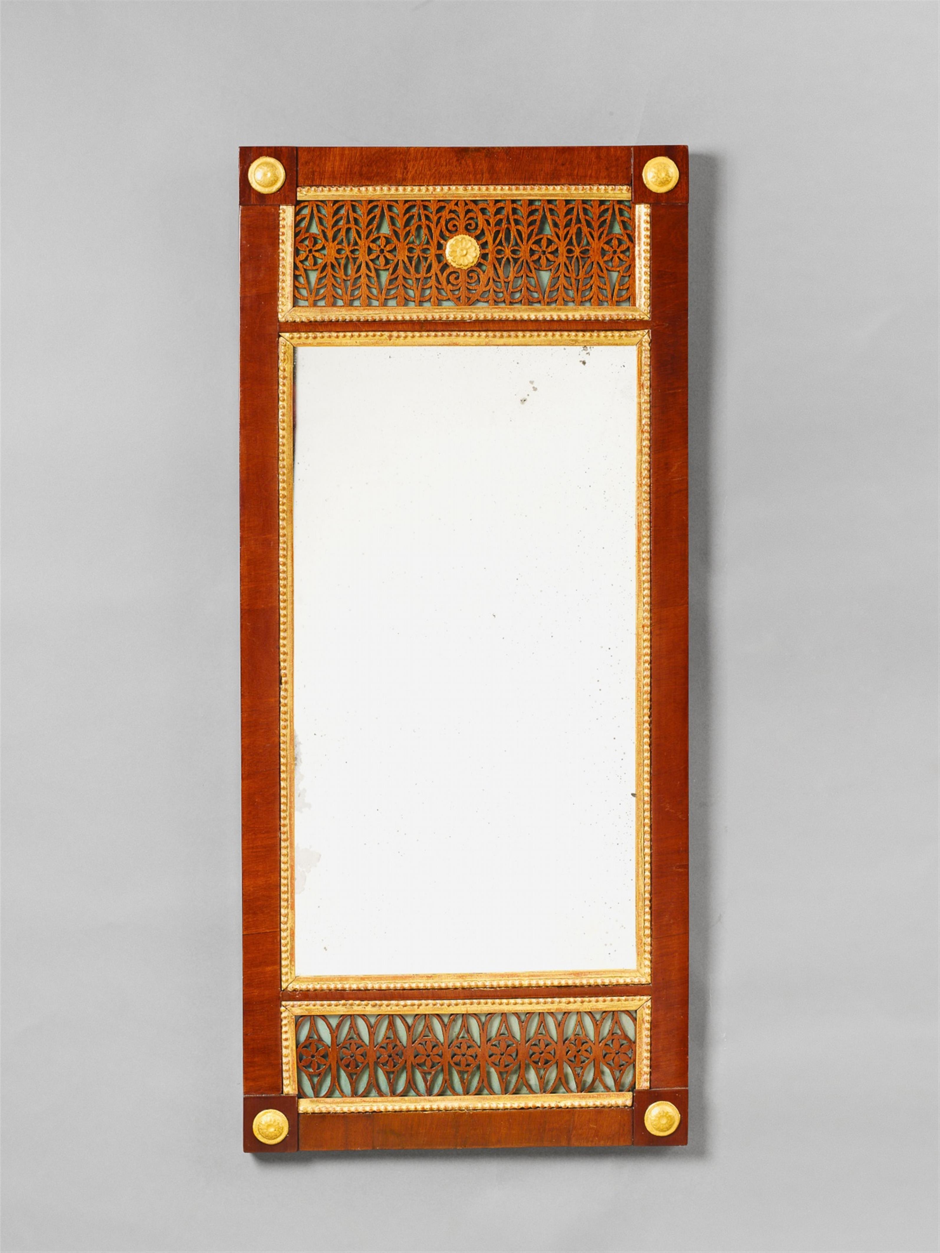 A North German neoclassical mahogany veneer mirror. - image-1