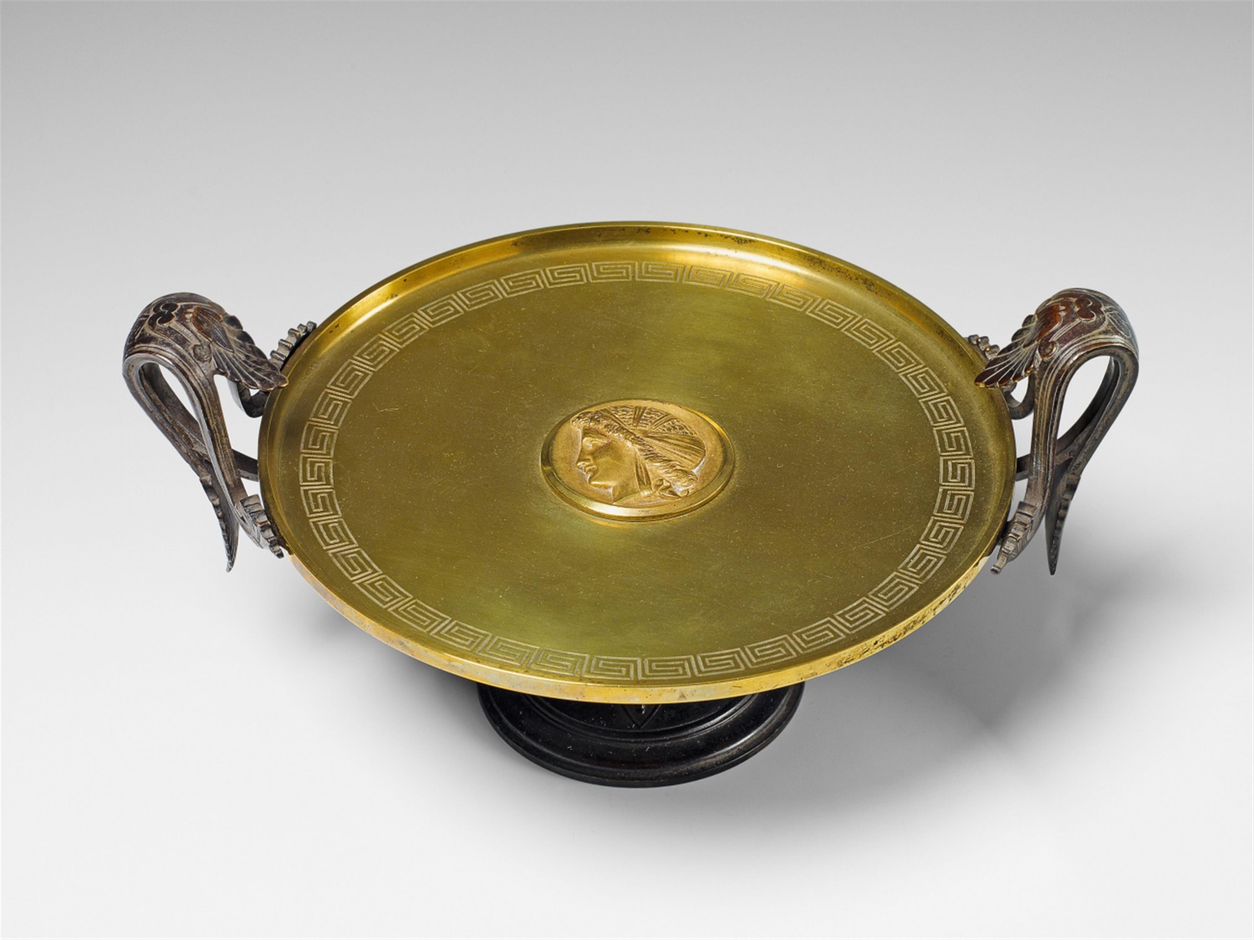 An Empire style parcel-gilt bronze stembowl. - image-1