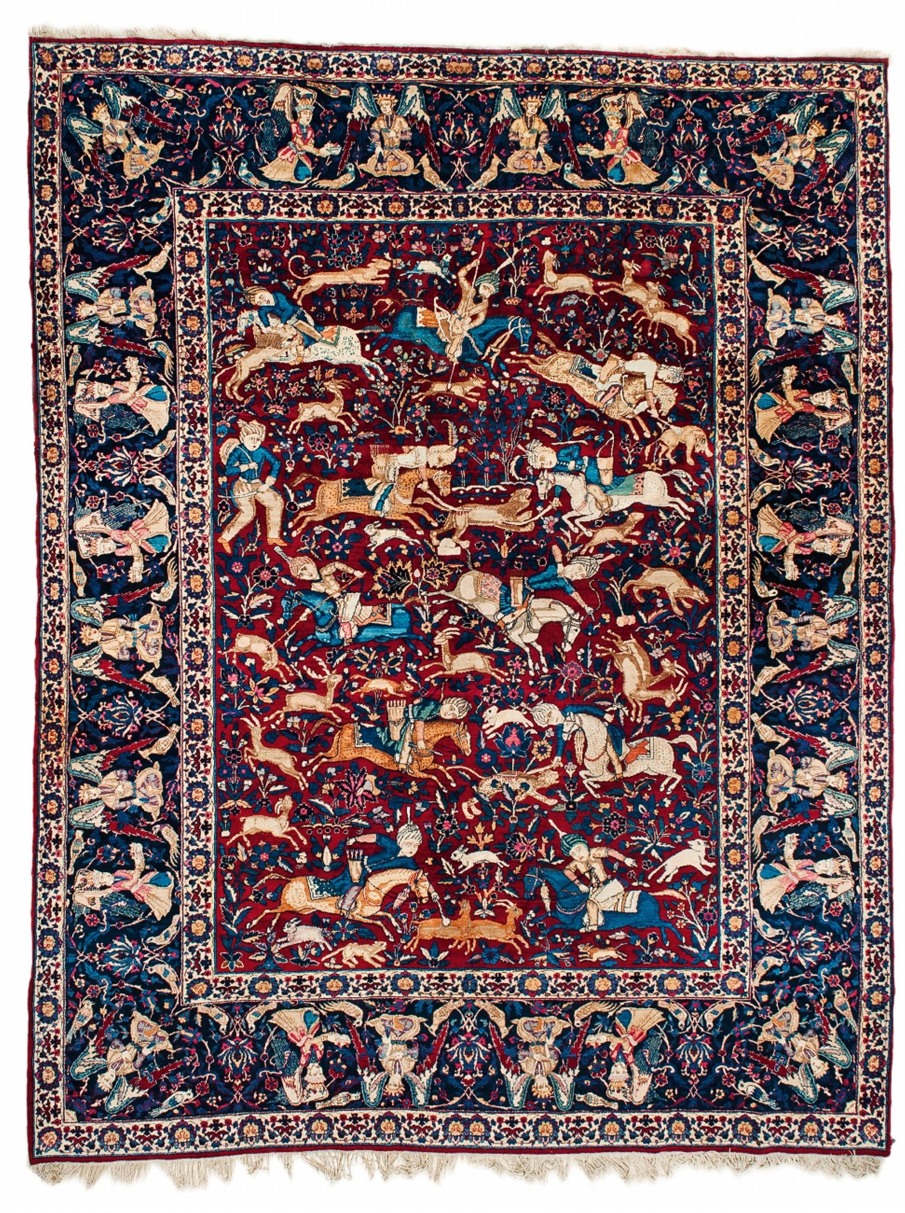 A South East Iranian wool and cotton Kerman rug with a hunting scene. - image-1