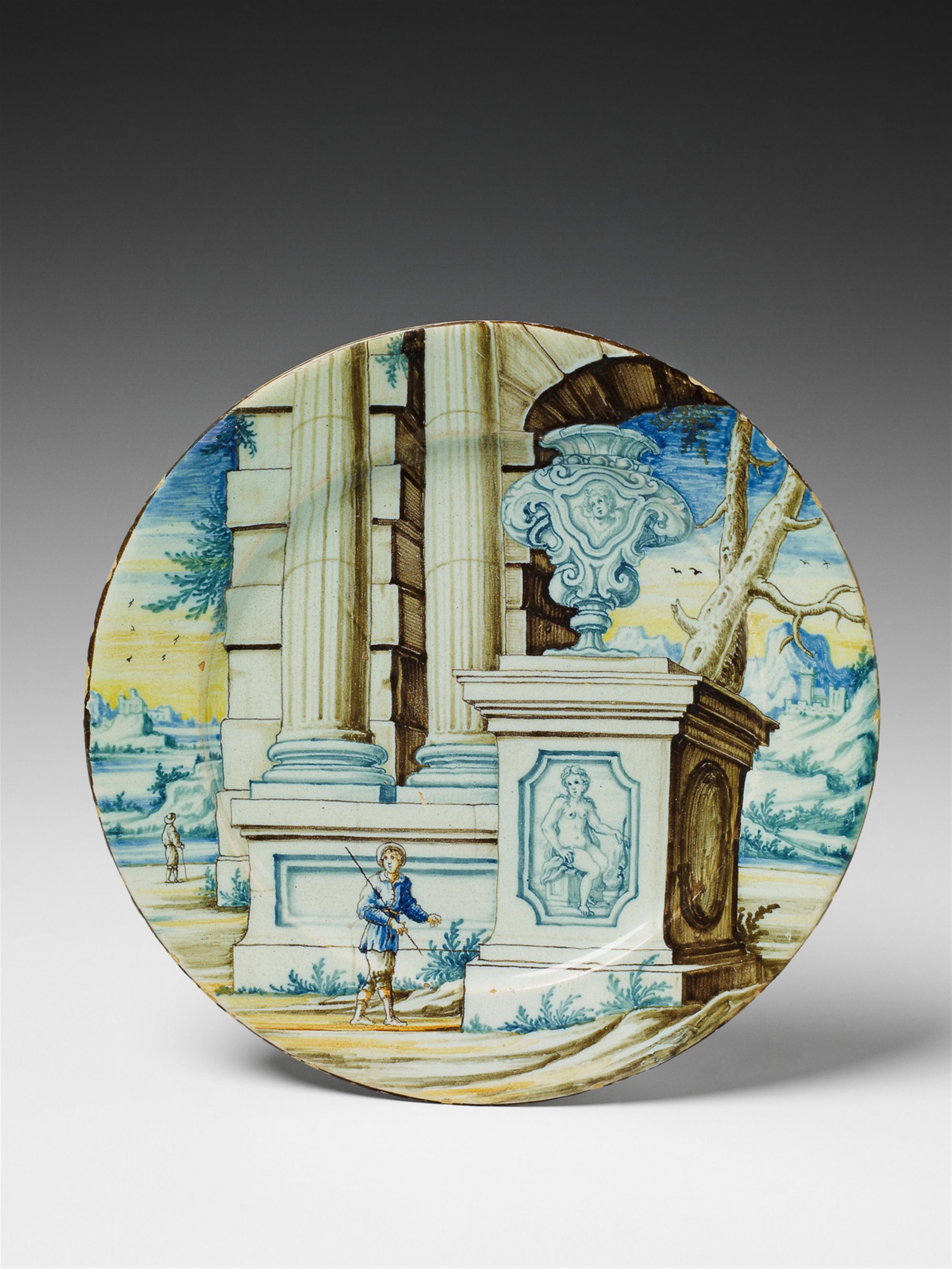 An early Bassano maiolica platter with architectural capriccio decor. - image-1